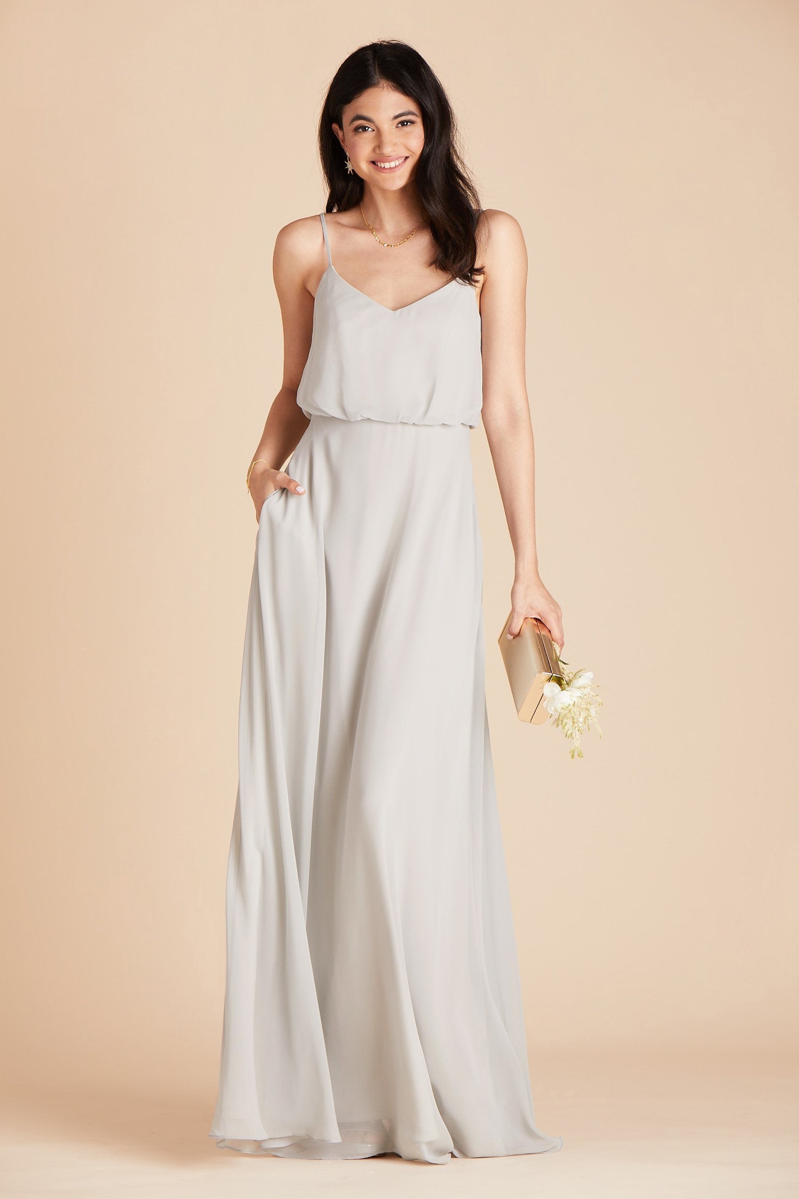 Gwennie bridesmaid dress in dove gray chiffon by Birdy Grey, front view with hand in pocket
