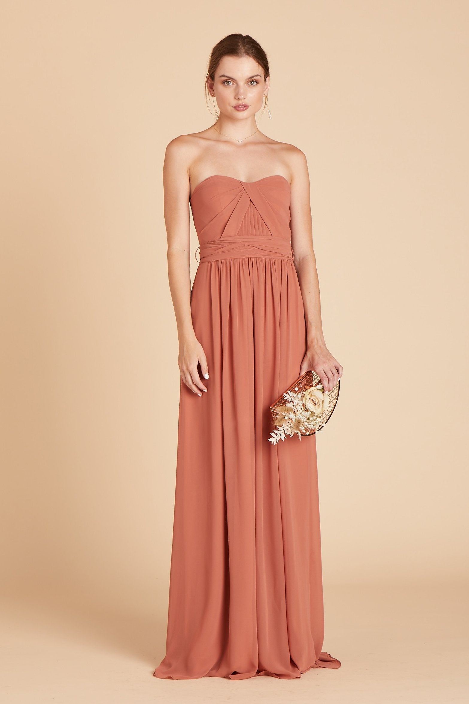 Front view of the Grace Convertible Dress in terracotta chiffon worn by a slender model with a light skin tone. 