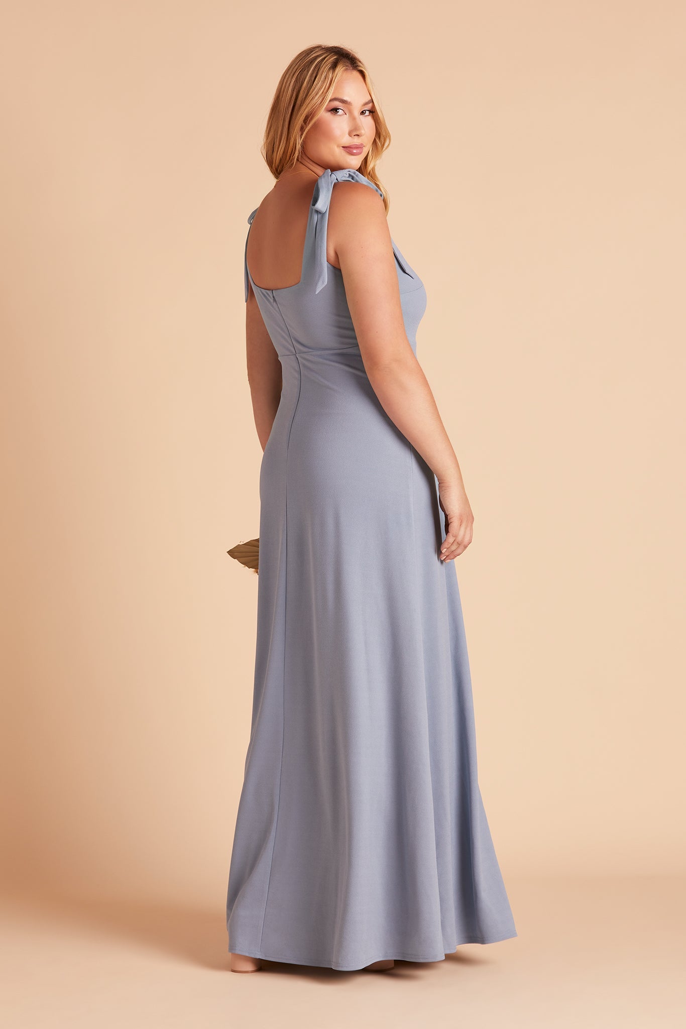 Alex convertible plus size bridesmaid dress with slit in dusty blue crepe by Birdy Grey, side view