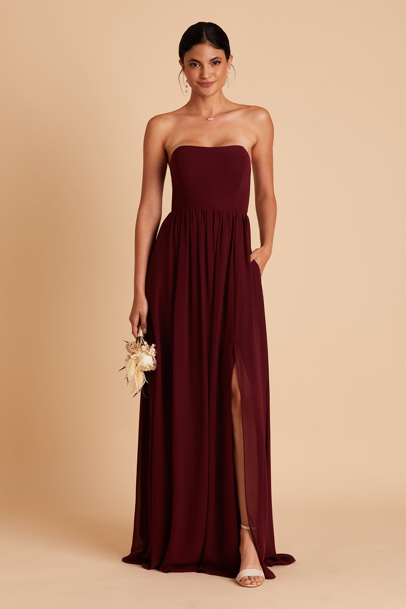 August bridesmaid dress with slit in cabernet chiffon by Birdy Grey, front view