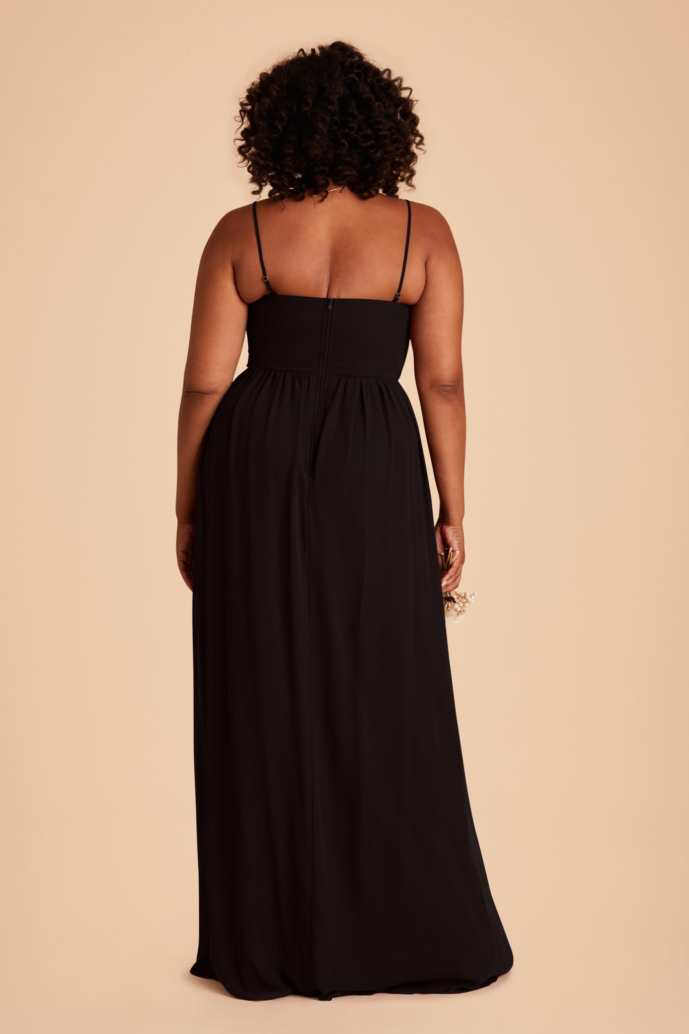 August plus size bridesmaid dress with slit in black chiffon by Birdy Grey, back view