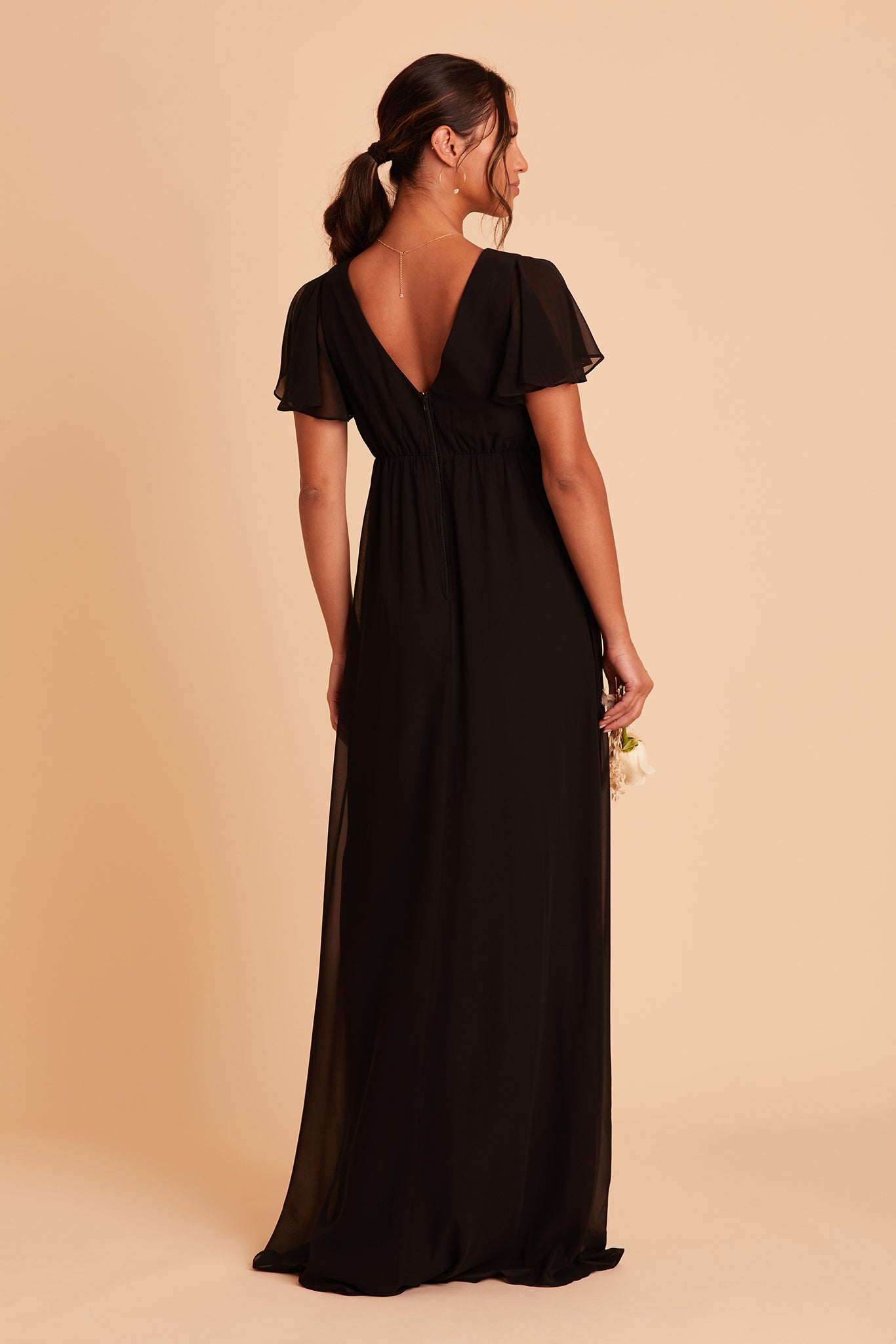 Hannah Empire bridesmaid dress with slit in black chiffon by Birdy Grey, back view