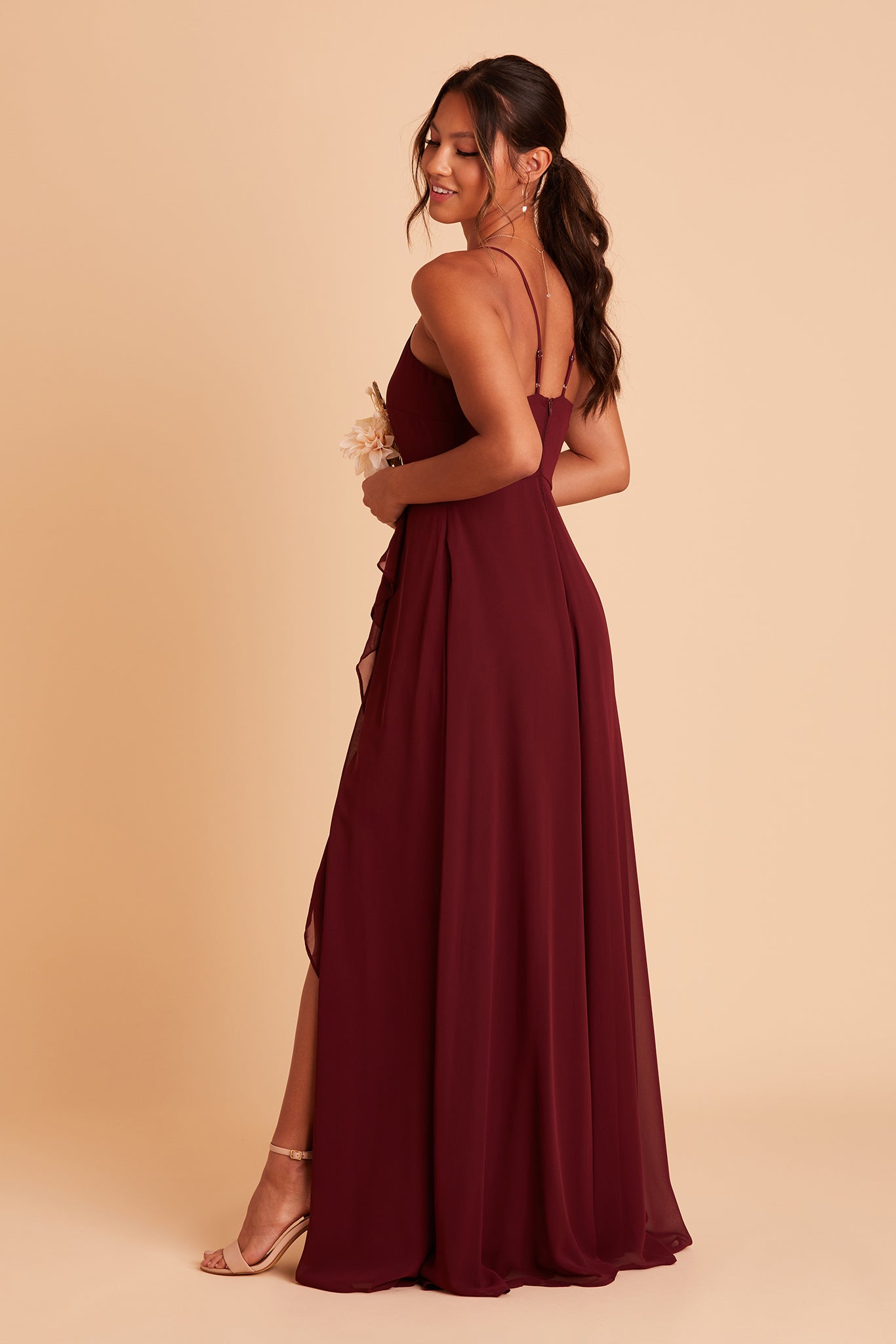 Theresa bridesmaid dress with slit in cabernet burgundy  chiffon  by Birdy Grey, side view