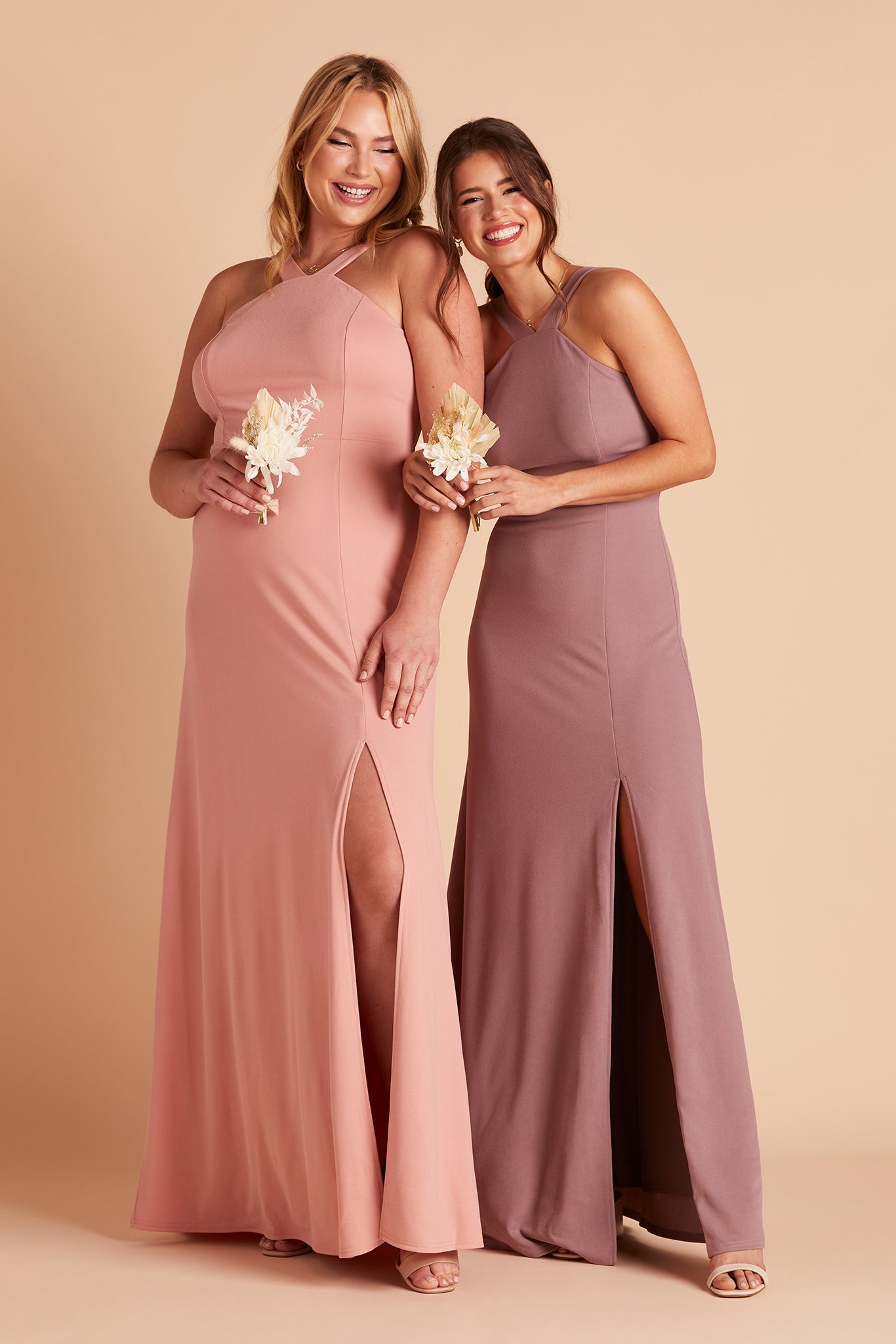 Two women in Gene bridesmaid dresses with slit in crepe by Birdy Grey, front view