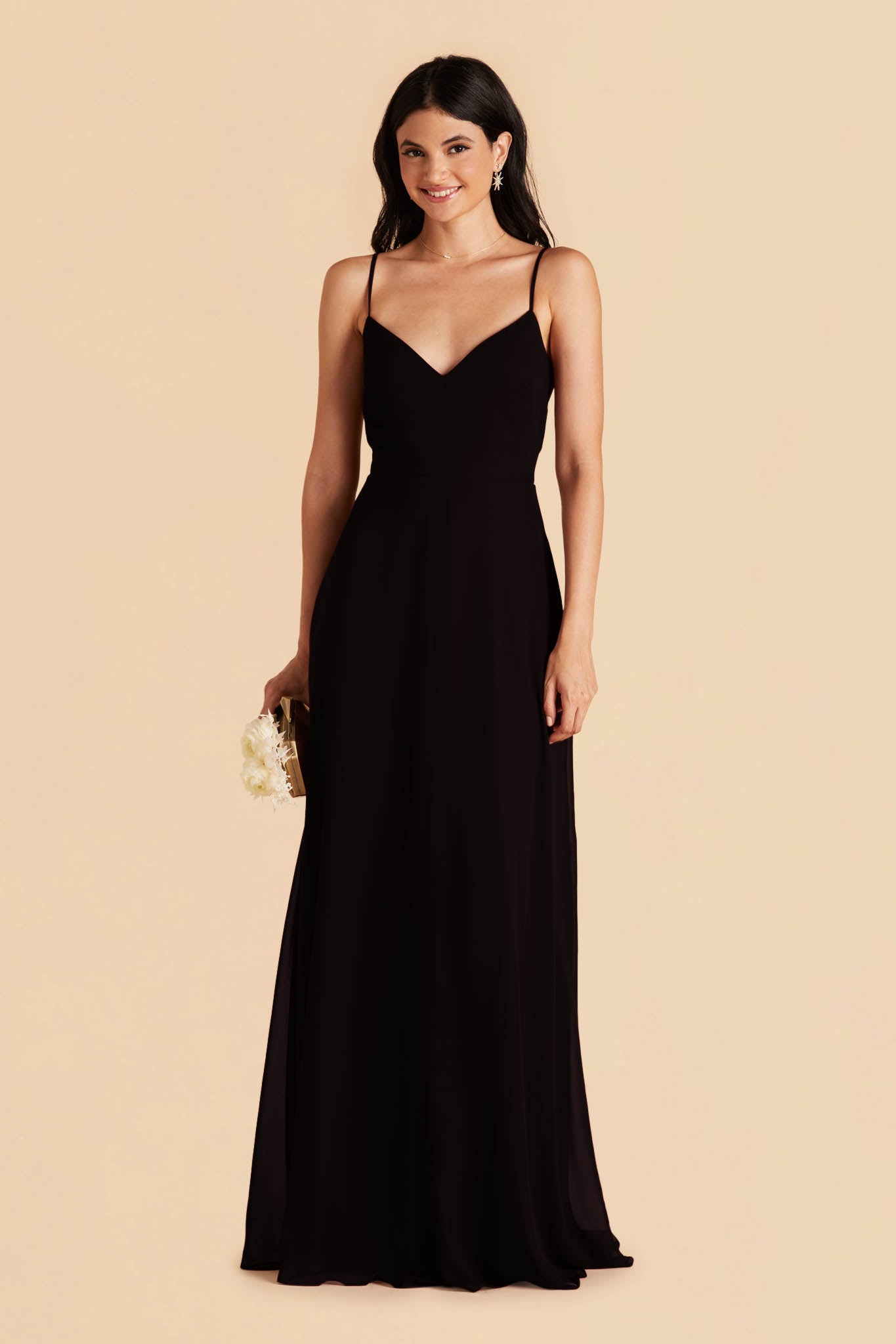 Long floor-sweeping black chiffon bridesmaid dress with a V-neckline and no sleeves