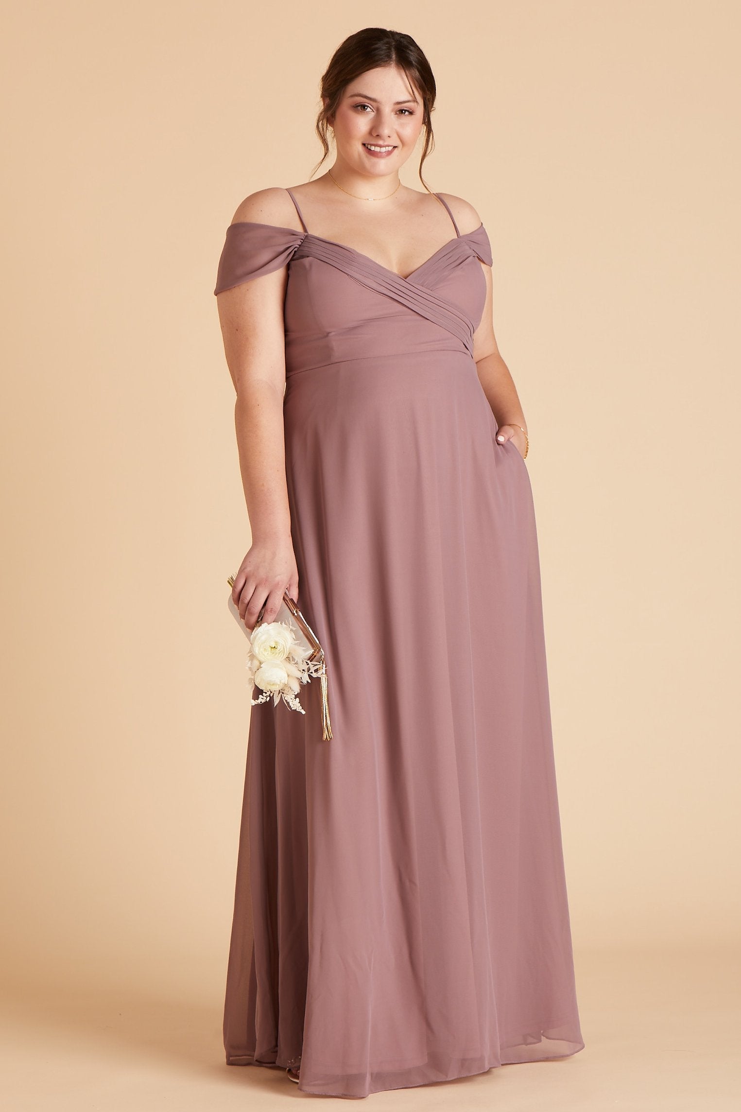 Spence convertible plus size bridesmaid dress in dark mauve chiffon by Birdy Grey, front view with hand in pocket