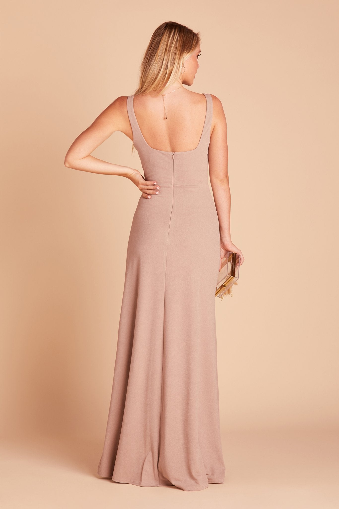 Back view of the Alex Convertible Bridesmaid Dress in taupe shows that the shoulder ties feature a square cut that falls just below the shoulder blades.