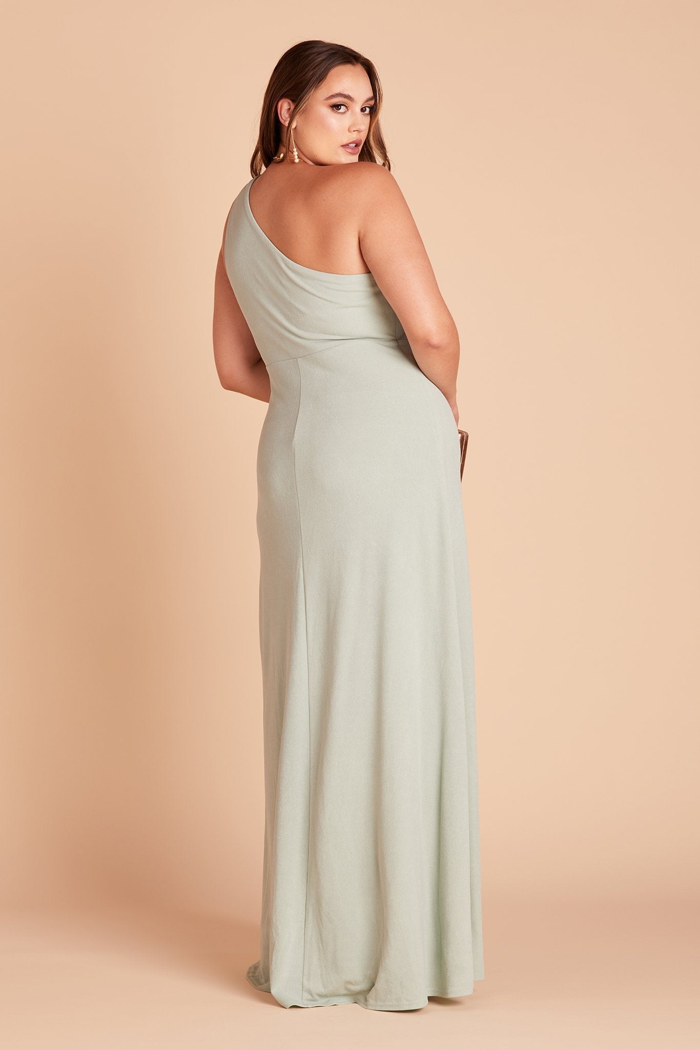Kira plus size bridesmaid dress with slit in sage green crepe by Birdy Grey, back view