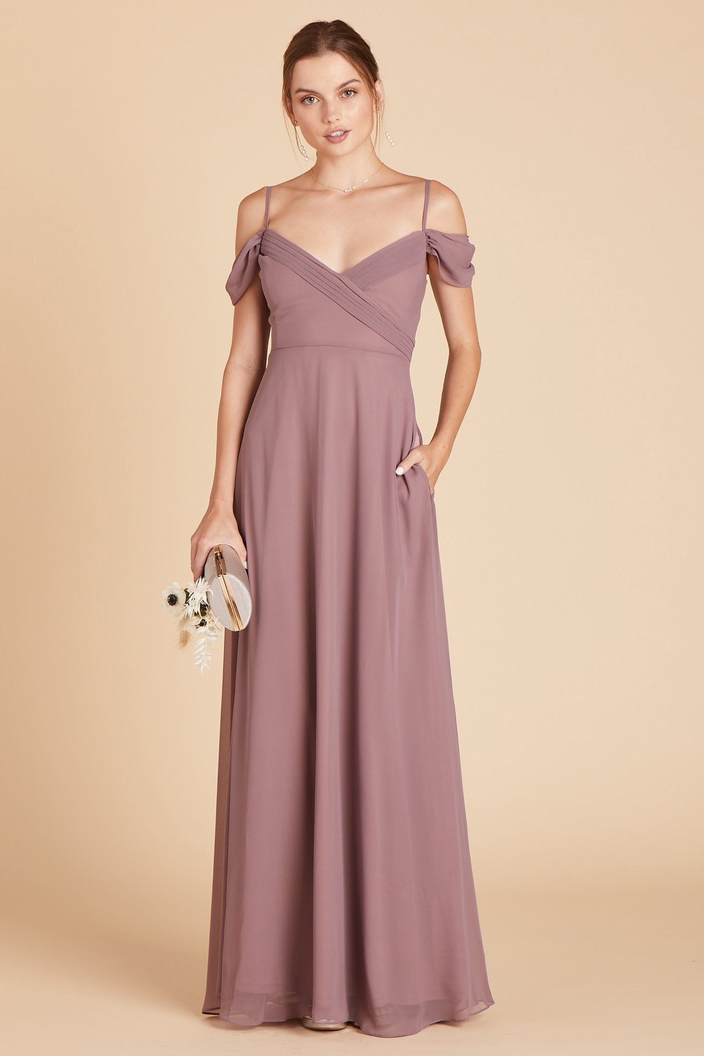 Spence convertible bridesmaid dress in dark mauve chiffon by Birdy Grey, front view with hand in pocket 