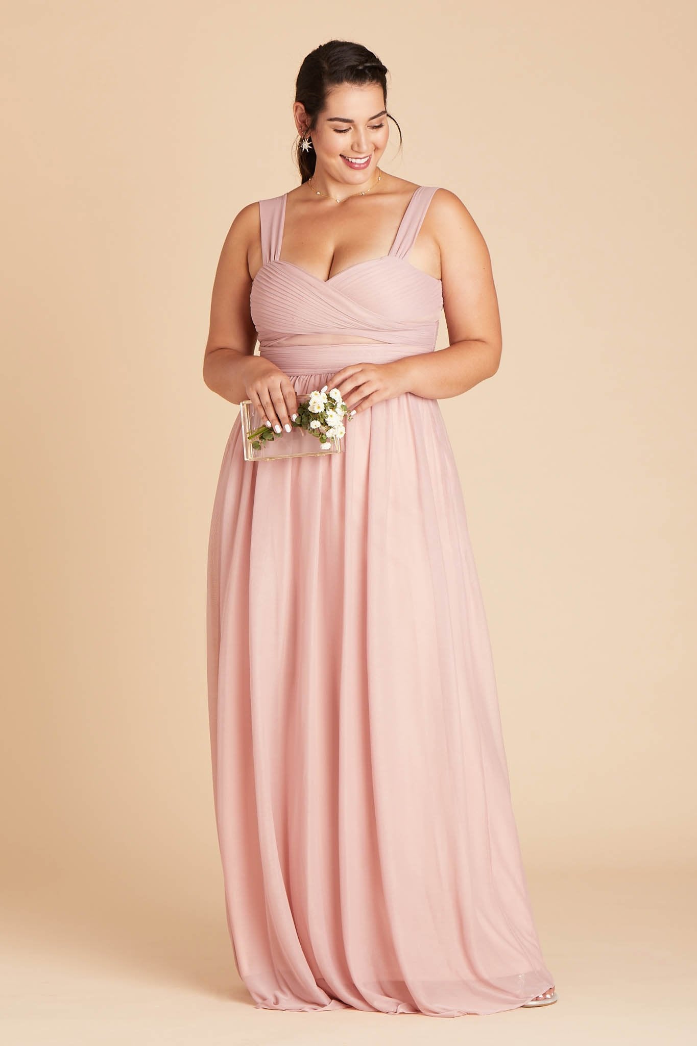 Front view of the floor-length Elsye Plus Size Bridesmaid Dress in dusty rose mesh by Birdy Grey features a sweetheart neckline and wide straps with a crisscross bust and peekaboo mesh cutouts.