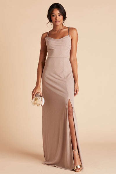 Front view of the floor-length Ash Bridesmaid Dress in taupe crepe by Birdy Grey with a slightly draped cowl neck front. The flowing skirt features a slit over the front left leg. 