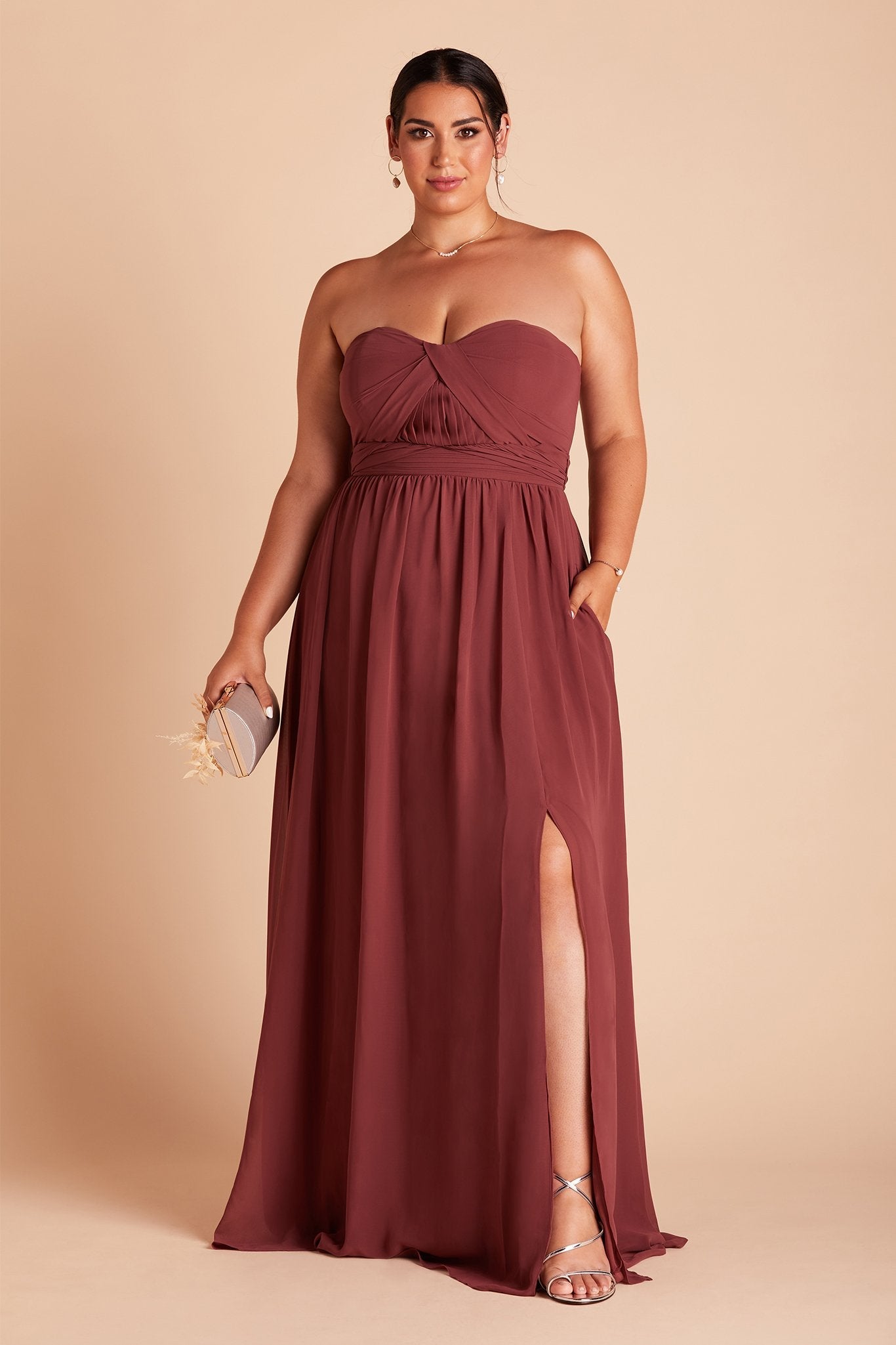 Grace convertible plus size bridesmaid dress with slit in rosewood chiffon by Birdy Grey, front view with hand in pocket