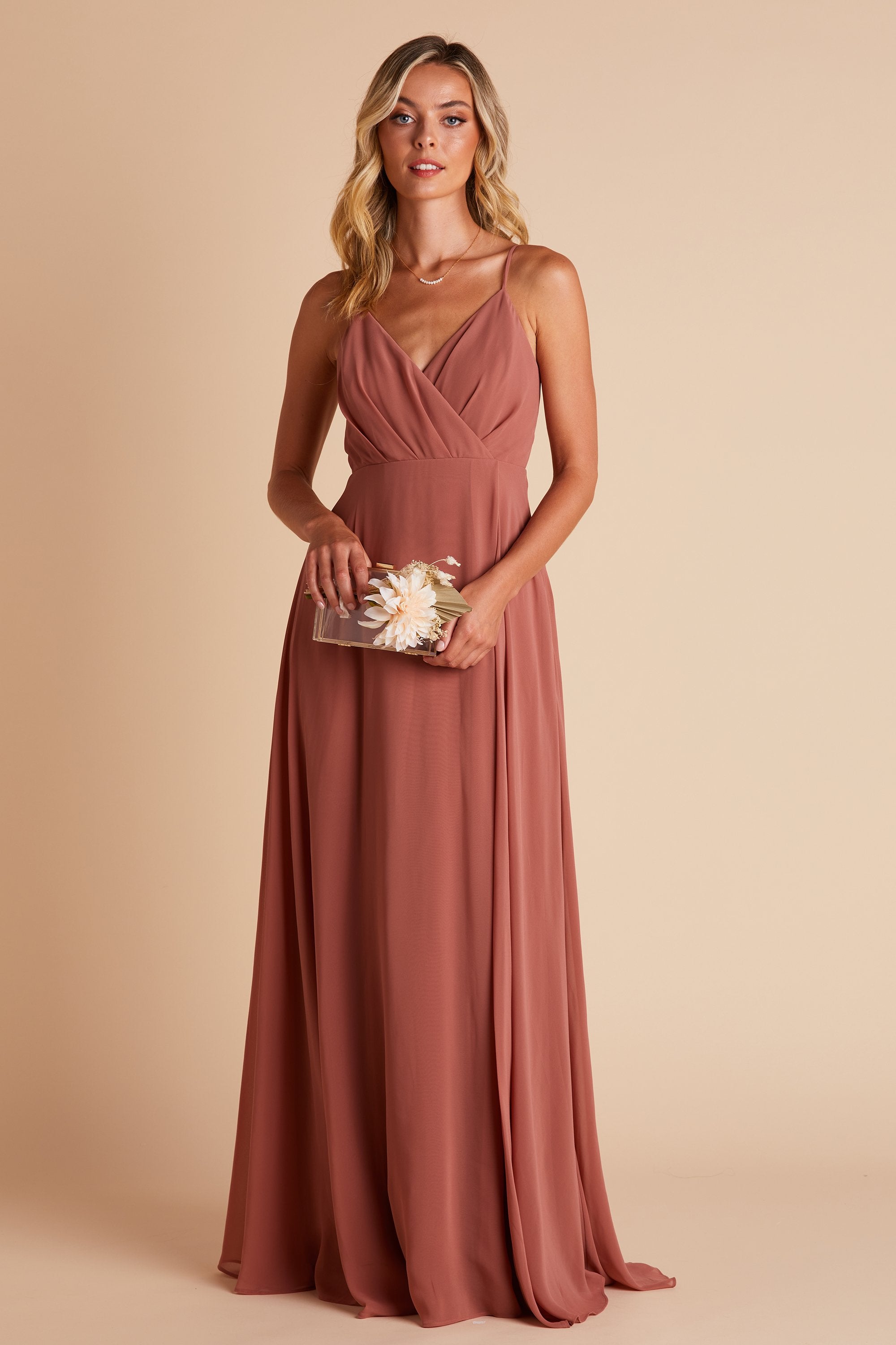 Front view of the Kaia Dress in desert rose chiffon worn by a slender model with a light skin tone. 