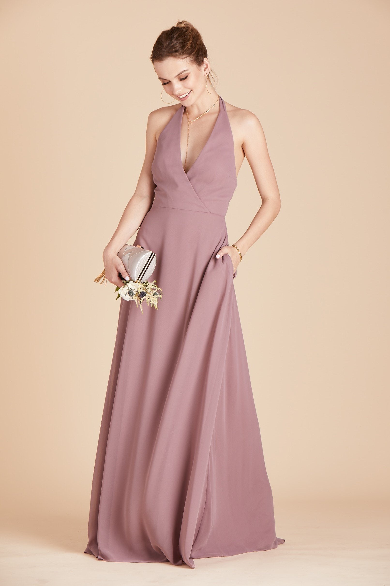 Moni convertible bridesmaids dress in dark mauve purple chiffon by Birdy Grey, front view with hand in pocket