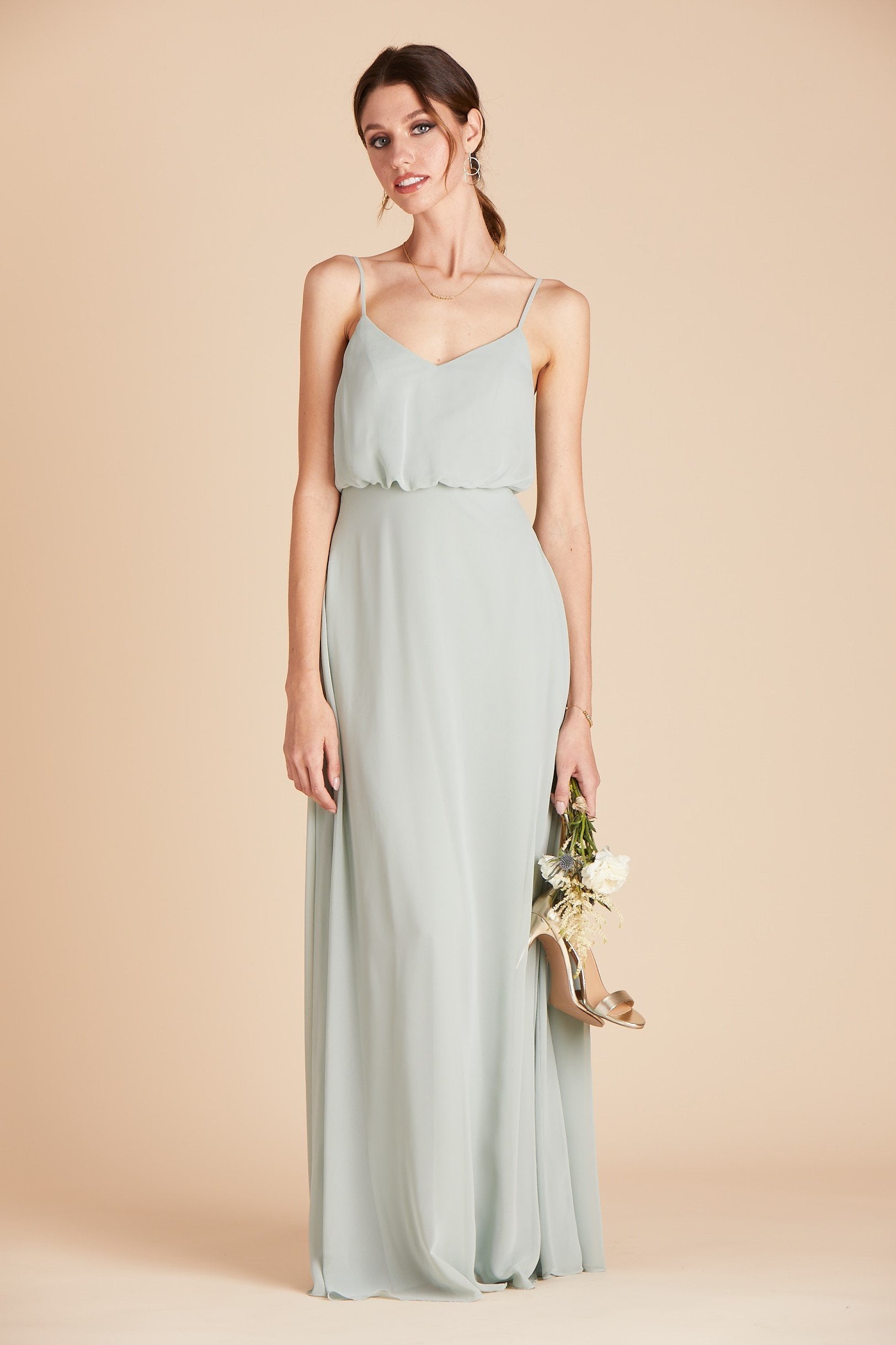 Front view of the Gwennie Dress in sage chiffon worn by a slender model with a light skin tone. 