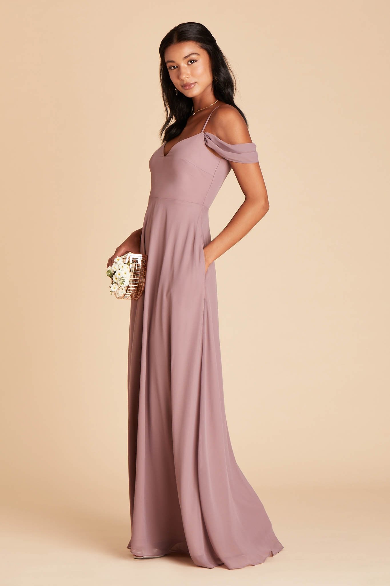 Devin convertible bridesmaid dress in dark mauve chiffon by Birdy Grey, side view with hand in pocket