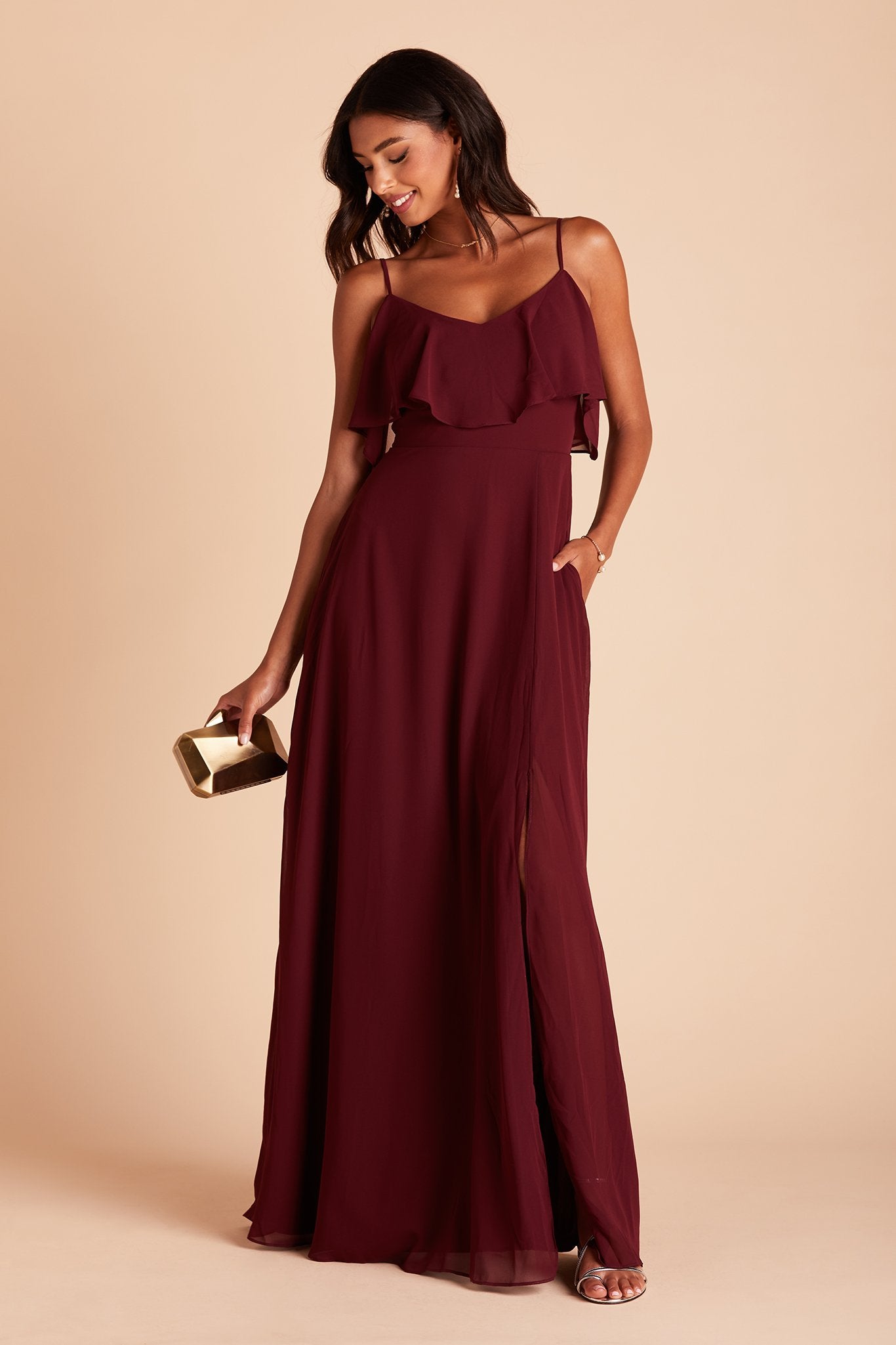 Jane convertible bridesmaid dress with slit in cabernet burgundy chiffon by Birdy Grey, front view with hand in pocket