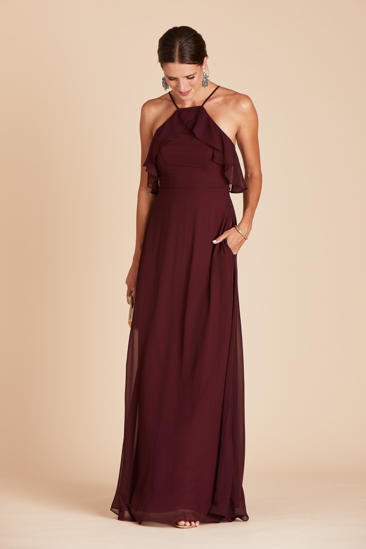 Jules bridesmaid dress in cabernet burgundy chiffon by Birdy Grey, front view with hand in pocket