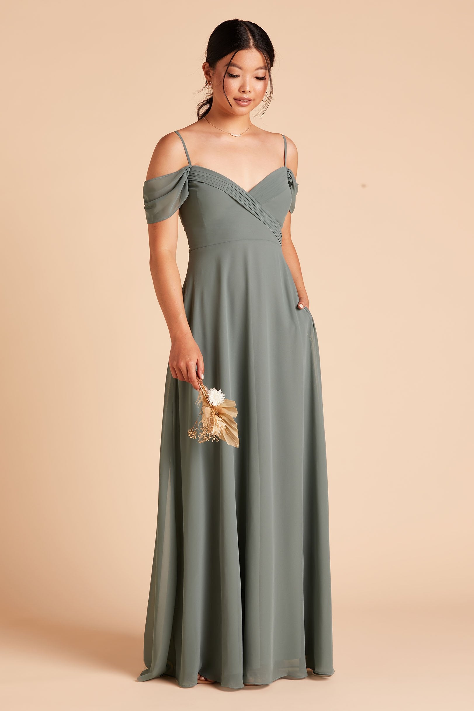 Spence convertible bridesmaid dress in sea glass green chiffon by Birdy Grey, side view with hand in pocket
