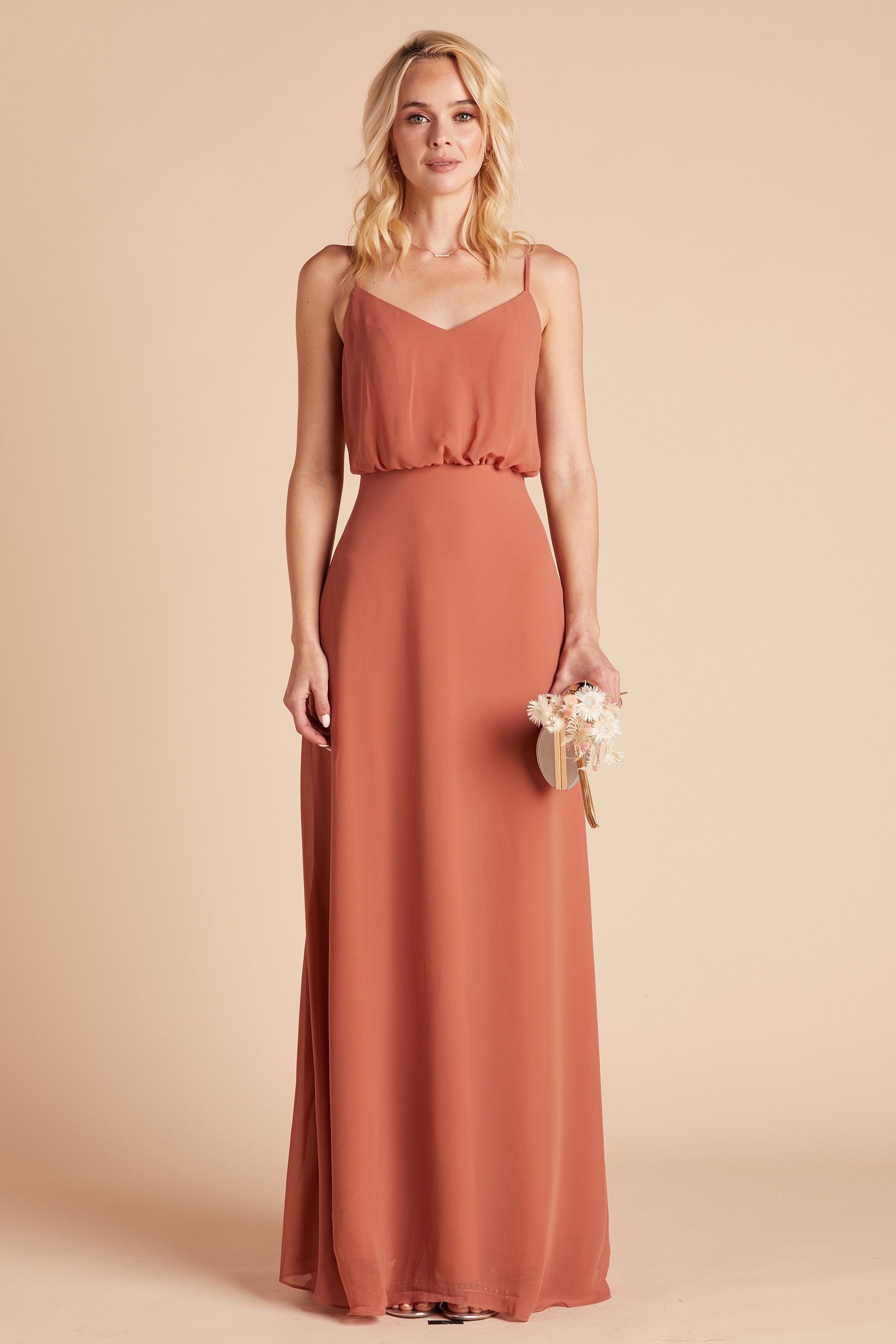 Front view of the Gwennie Dress in terracotta chiffon worn by a slender model with a light skin tone.
