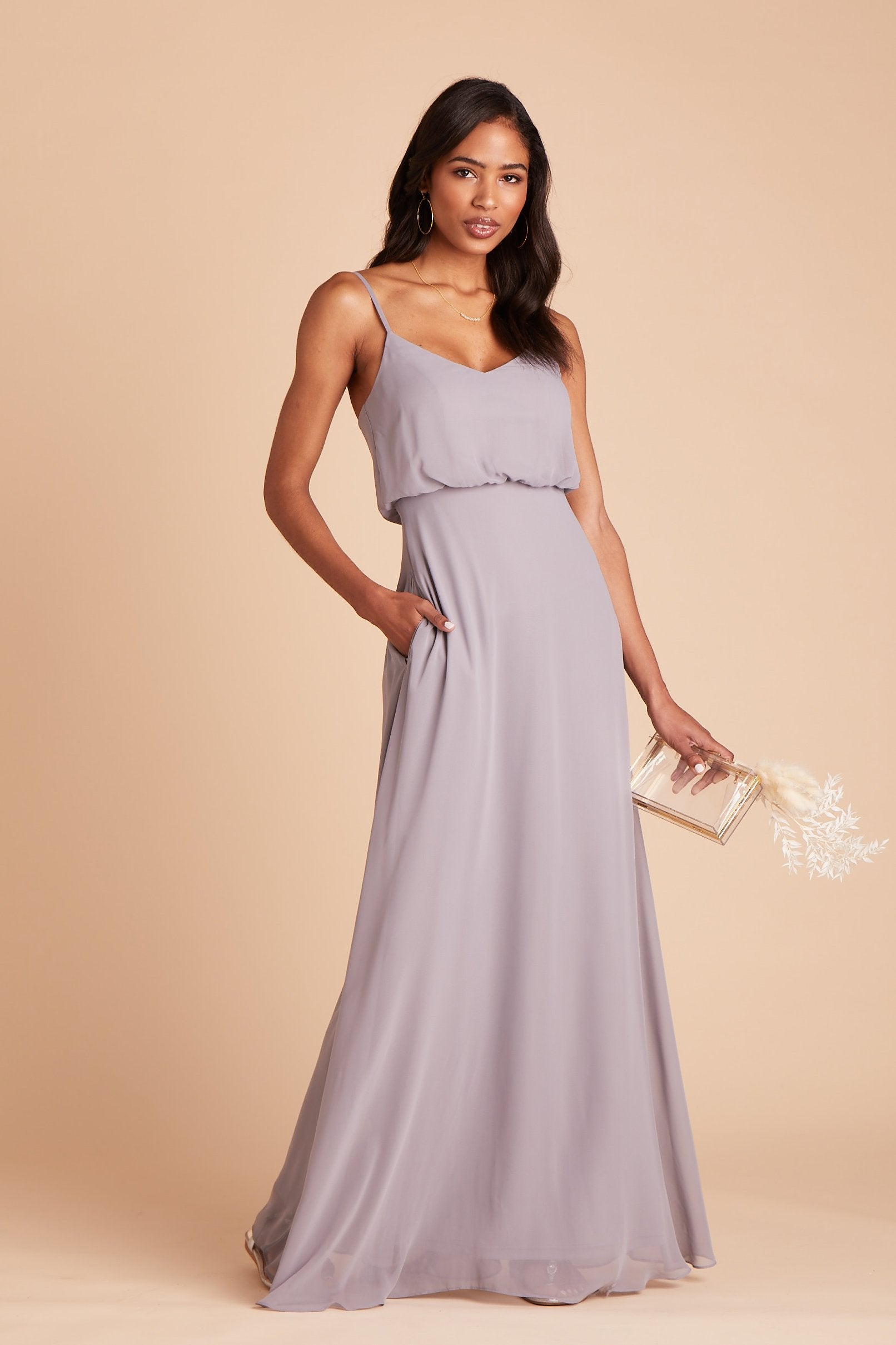 Gwennie bridesmaid dress in silver chiffon by Birdy Grey, front view with hand in pocket