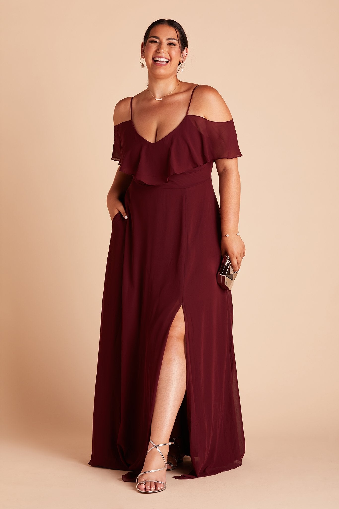 Jane convertible plus size bridesmaid dress with slit in Cabernet Burgundy chiffon by Birdy Grey, front view with hand in pocket
