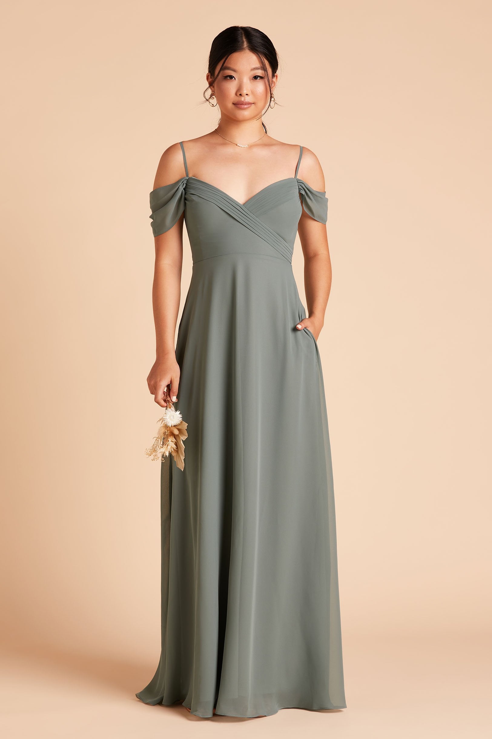 Spence convertible bridesmaid dress in sea glass green chiffon by Birdy Grey, front view with hand in pocket