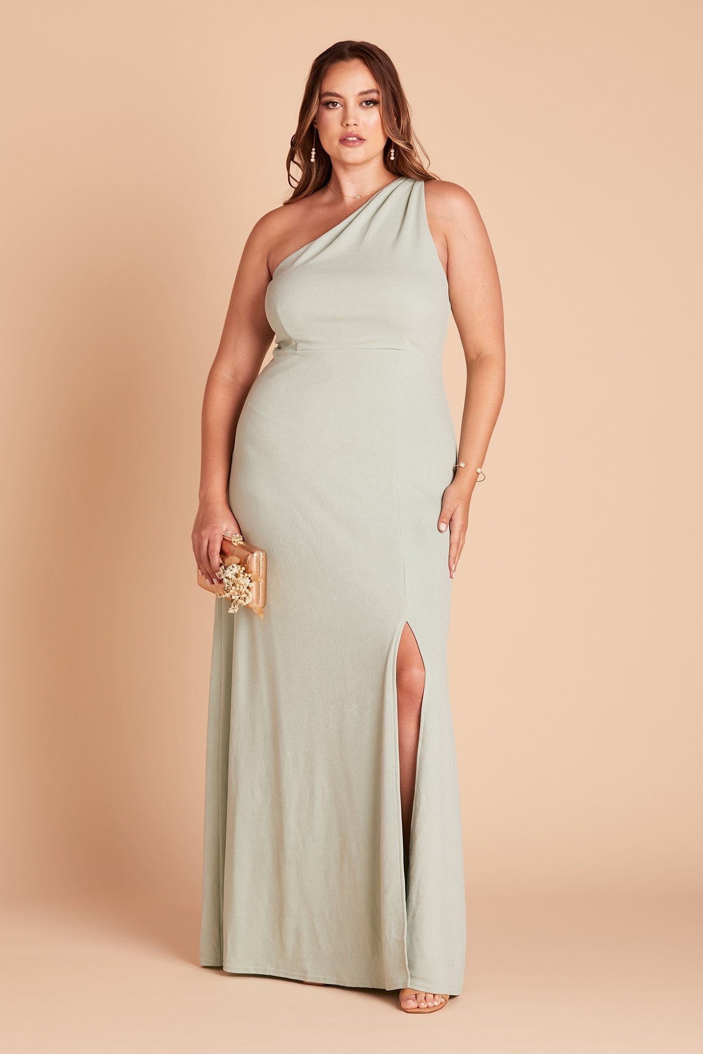 Kira plus size bridesmaid dress with slit in sage green crepe by Birdy Grey, front view