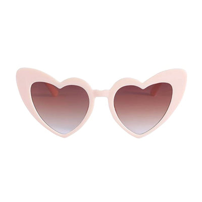 Front view of Heart Sunglasses by Birdy Grey in nude with a smoky lens. The retro style features a flirty and fun high-pointed cat-eye heart shape frame.