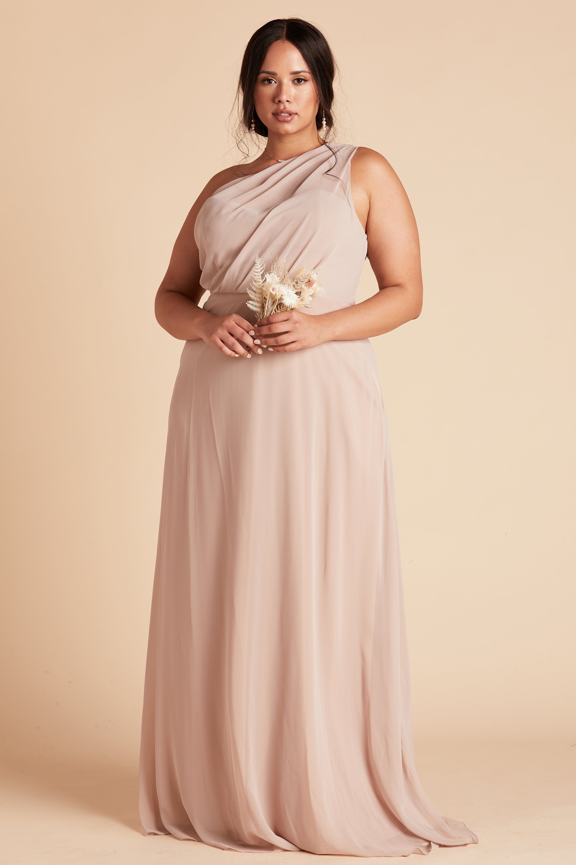 Front view of the Kira Dress Curve in taupe chiffon worn by a full-figured model with a medium skin tone. 