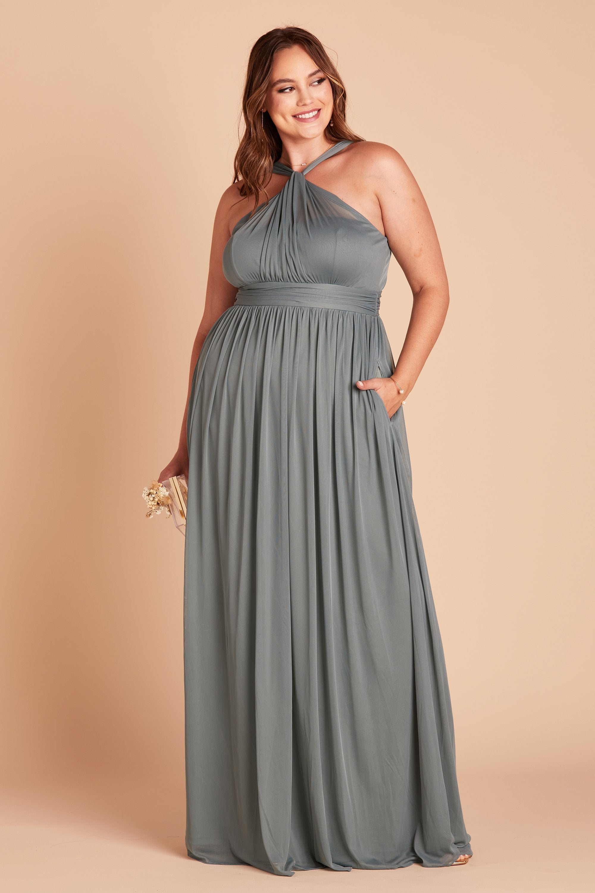 Kiko plus size bridesmaid dress in sea glass green chiffon by Birdy Grey, front view with hand in pocket