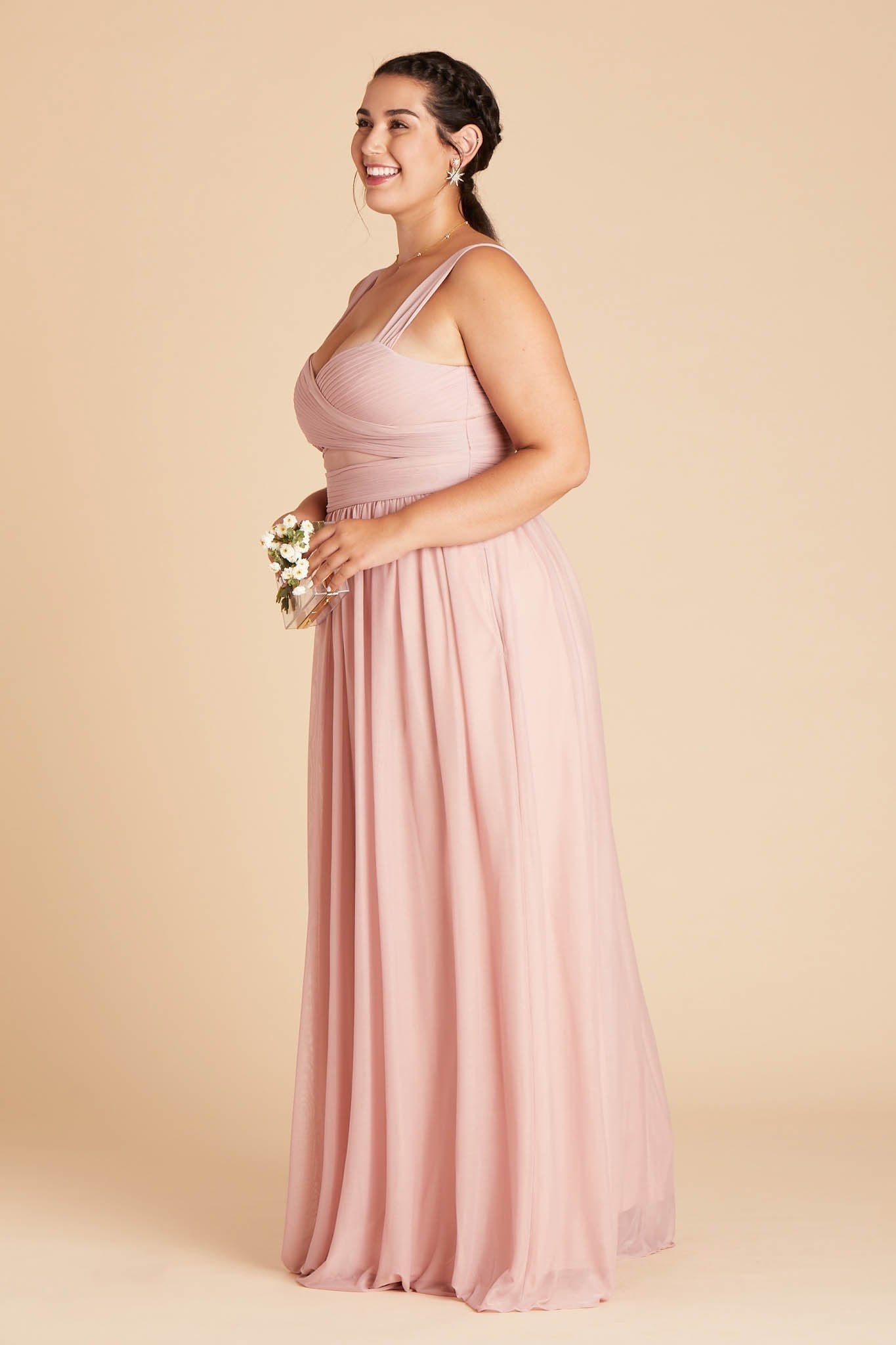 Side view model wearing Elsye Plus Size Bridesmaid Dress in dusty rose mesh paired with the Brighton Pearl Necklace by Birdy Grey.