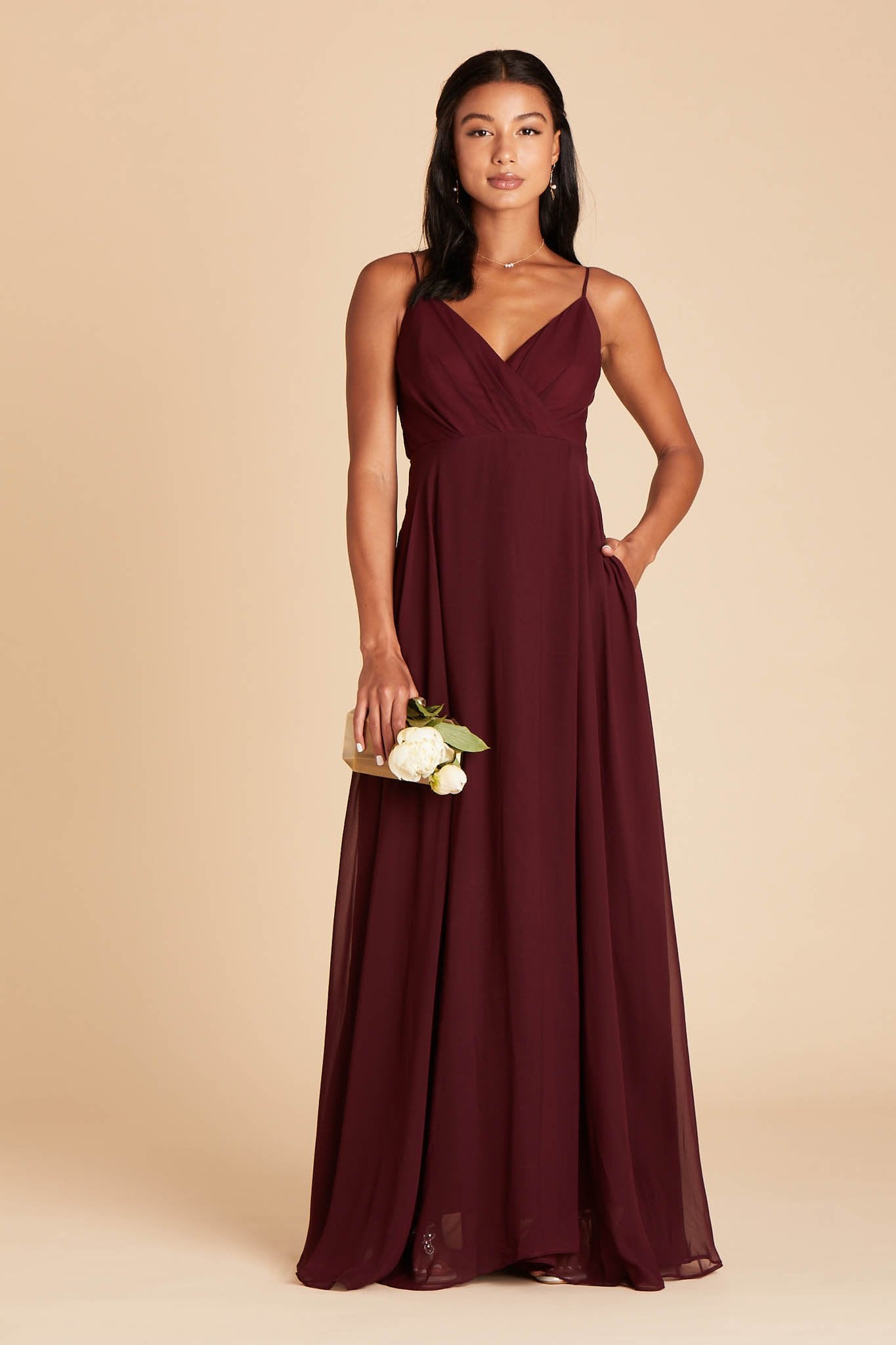 Kaia bridesmaids dress in cabernet burgundy chiffon by Birdy Grey, front view with hand in pocket