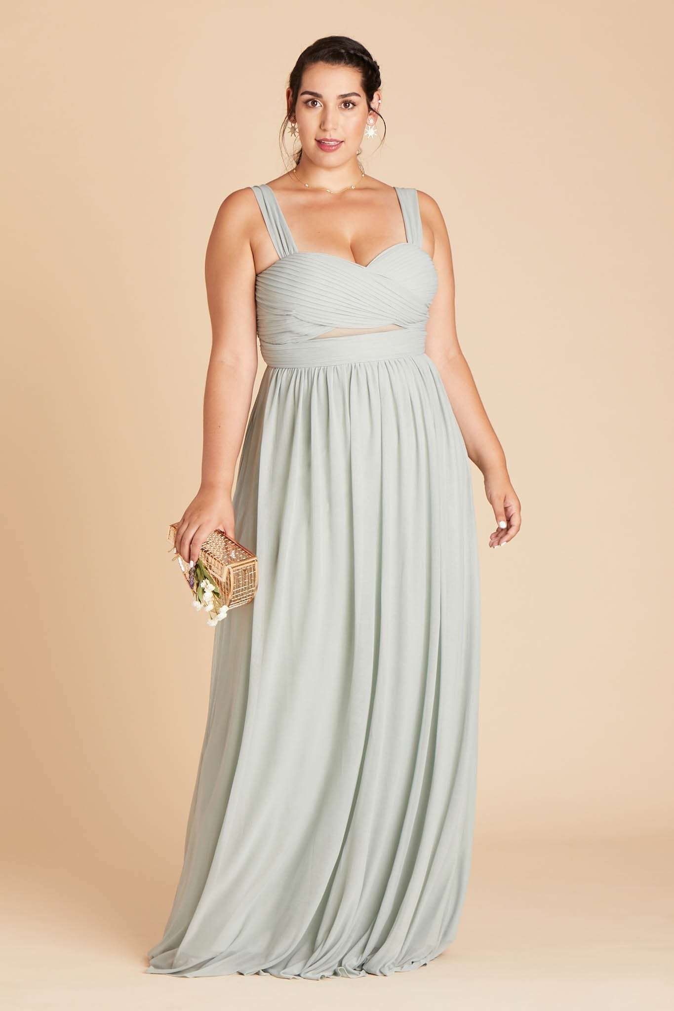 Front view of the floor-length Elsye Plus Size Bridesmaid Dress in sage mesh by Birdy Grey features a sweetheart neckline and wide straps with a crisscross bust and peekaboo mesh cutouts.