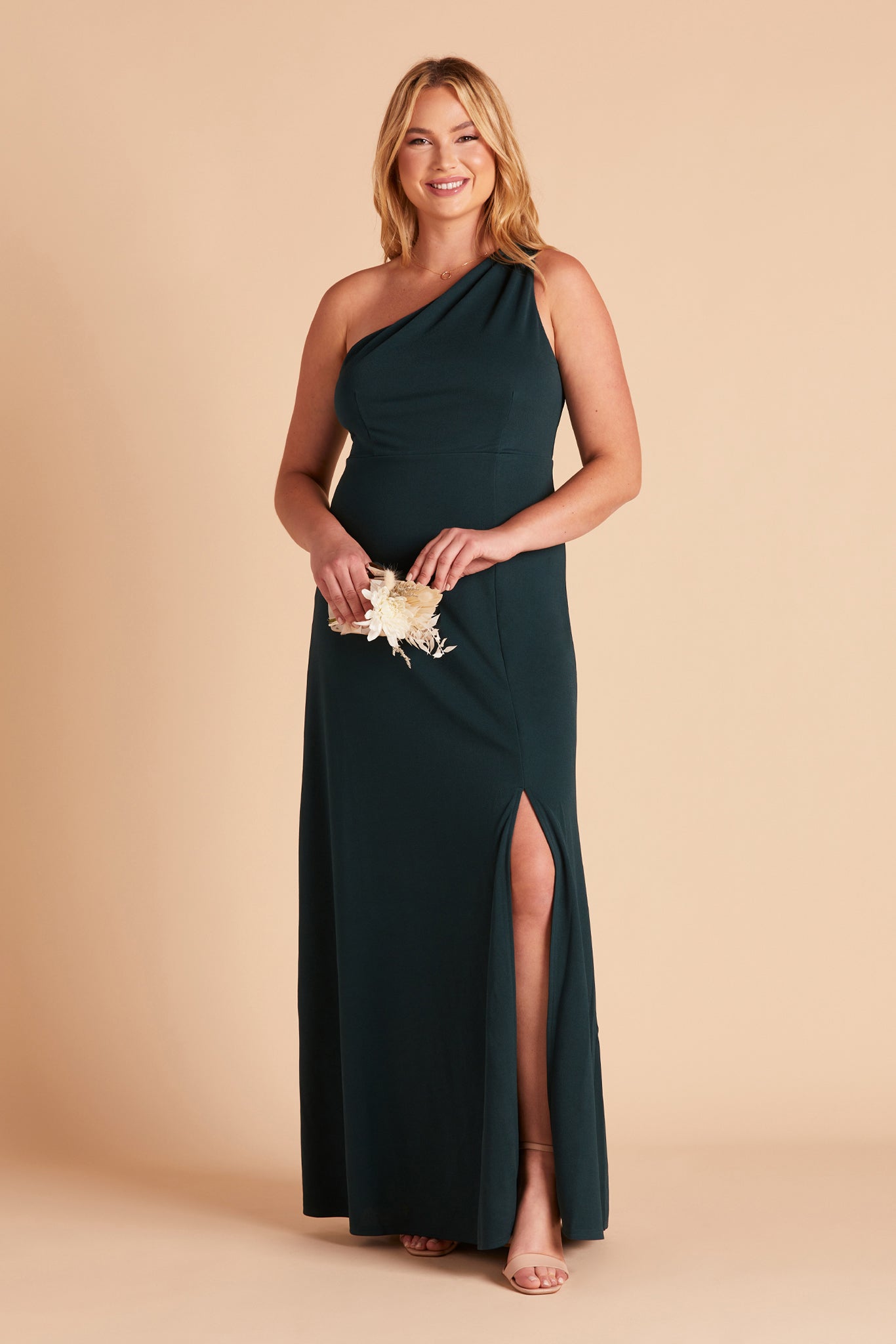 Kira plus size bridesmaid dress with slit in emerald green crepe by Birdy Grey, front view