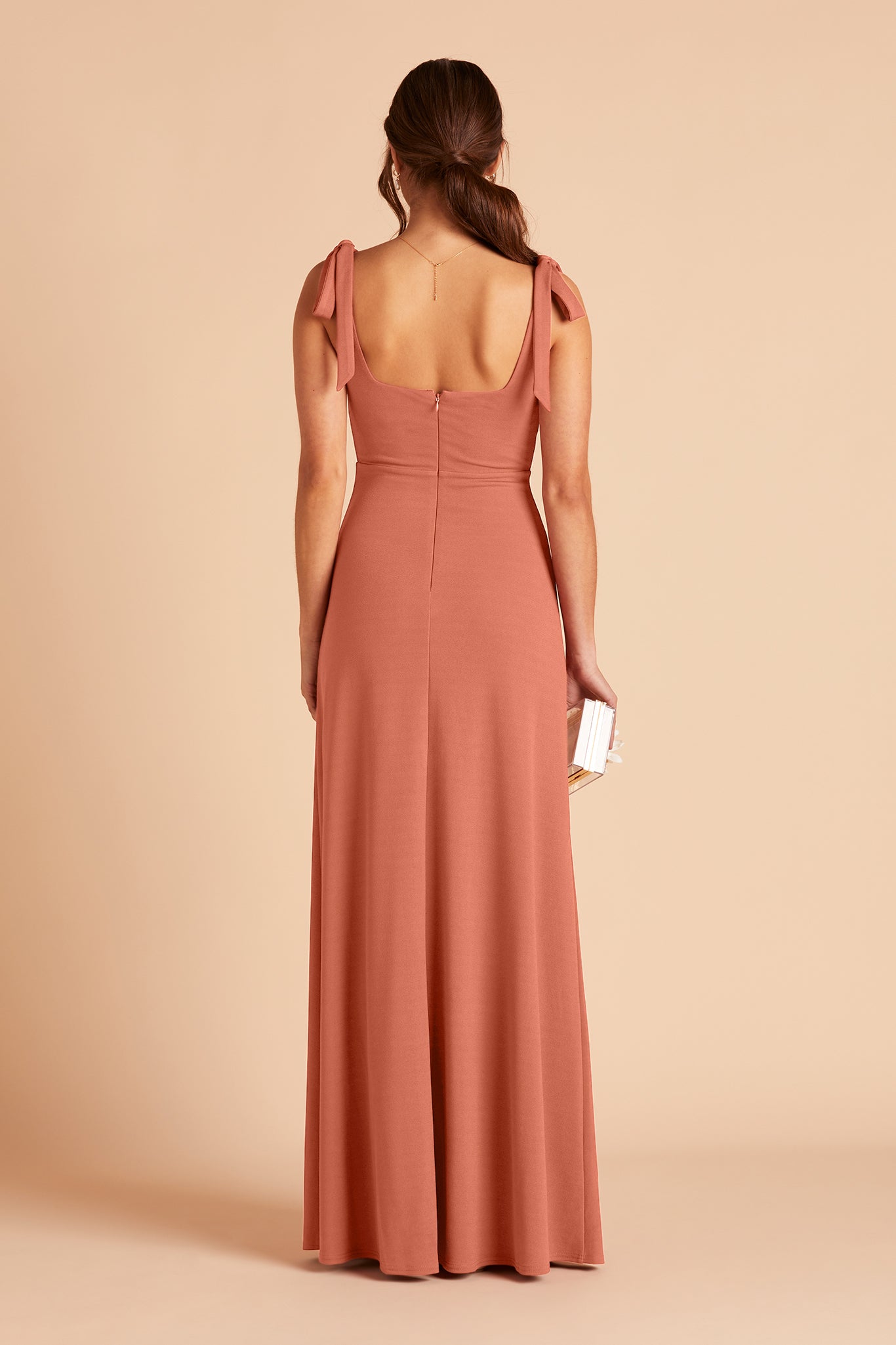 Alex convertible bridesmaid dress with slit in terracotta crepe by Birdy Grey, back view