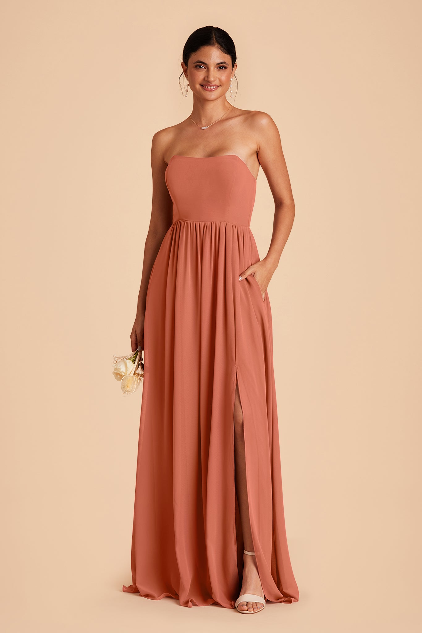August bridesmaid dress with slit in terracotta chiffon by Birdy Grey, front view