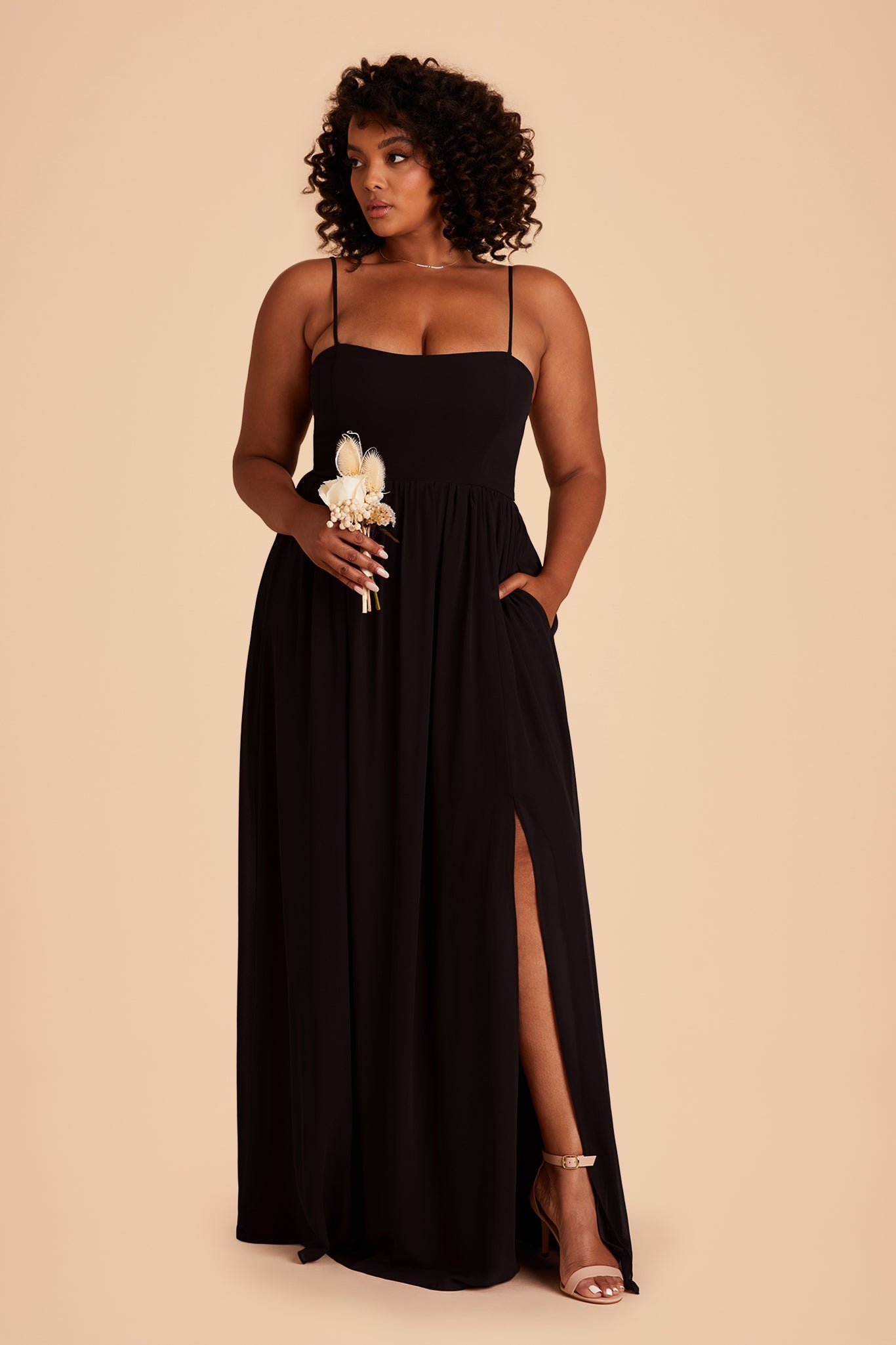 August plus size bridesmaid dress with slit in black chiffon by Birdy Grey, front view