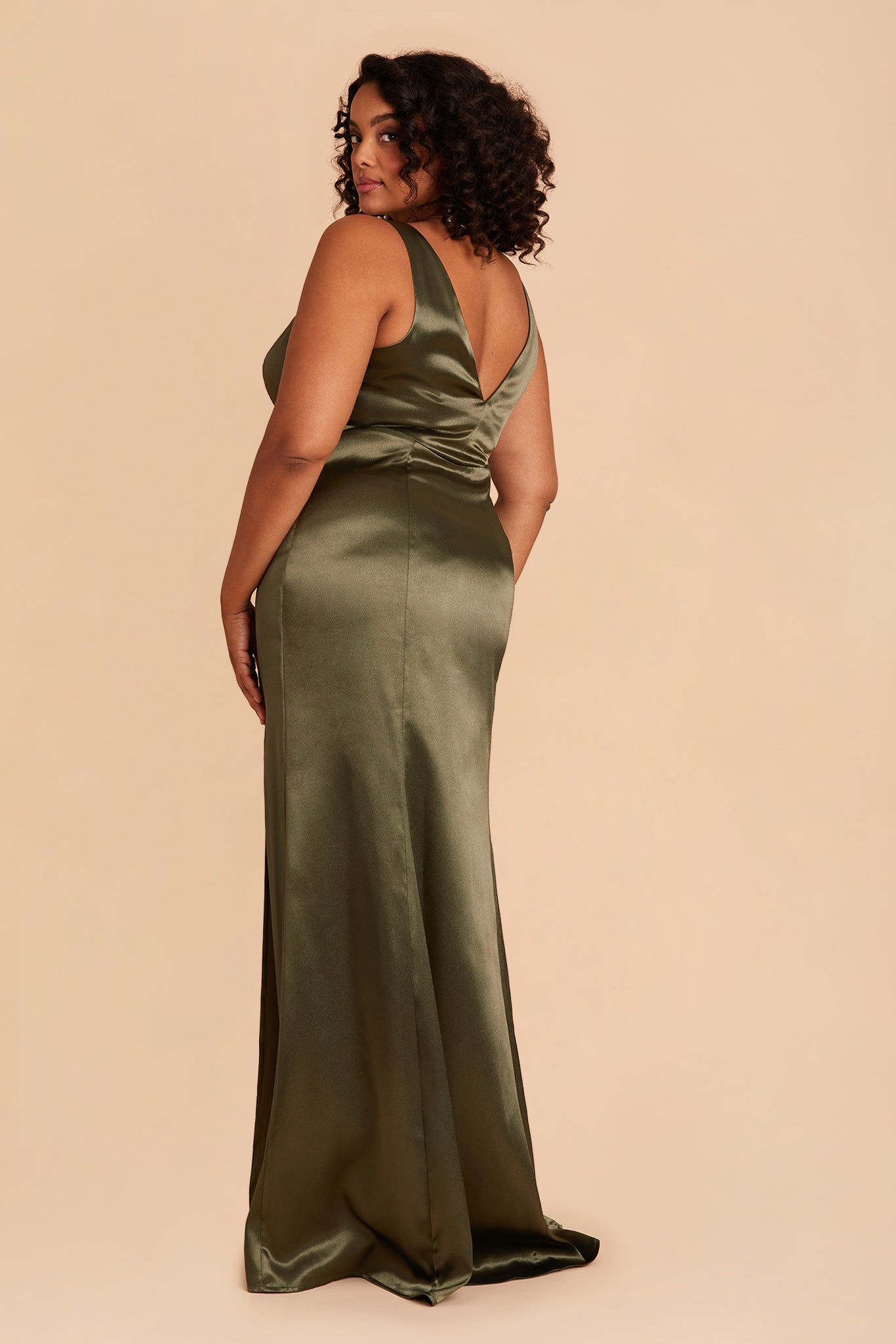 Gloria plus size bridesmaid dress with slit in olive satin by Birdy Grey, side view