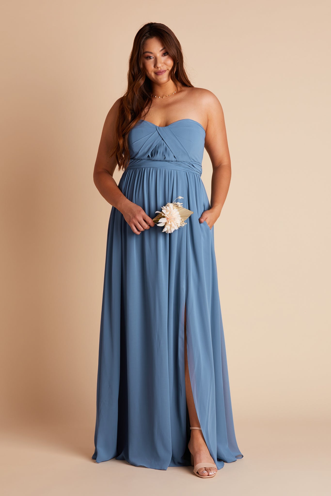 Grace convertible plus size bridesmaid dress with slit in twilight blue chiffon by Birdy Grey, front view with hand in pocket