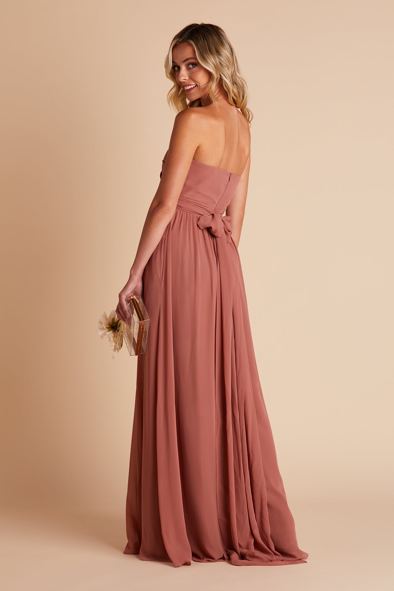 Grace convertible bridesmaid dress with slit in desert rose by Birdy Grey, side view