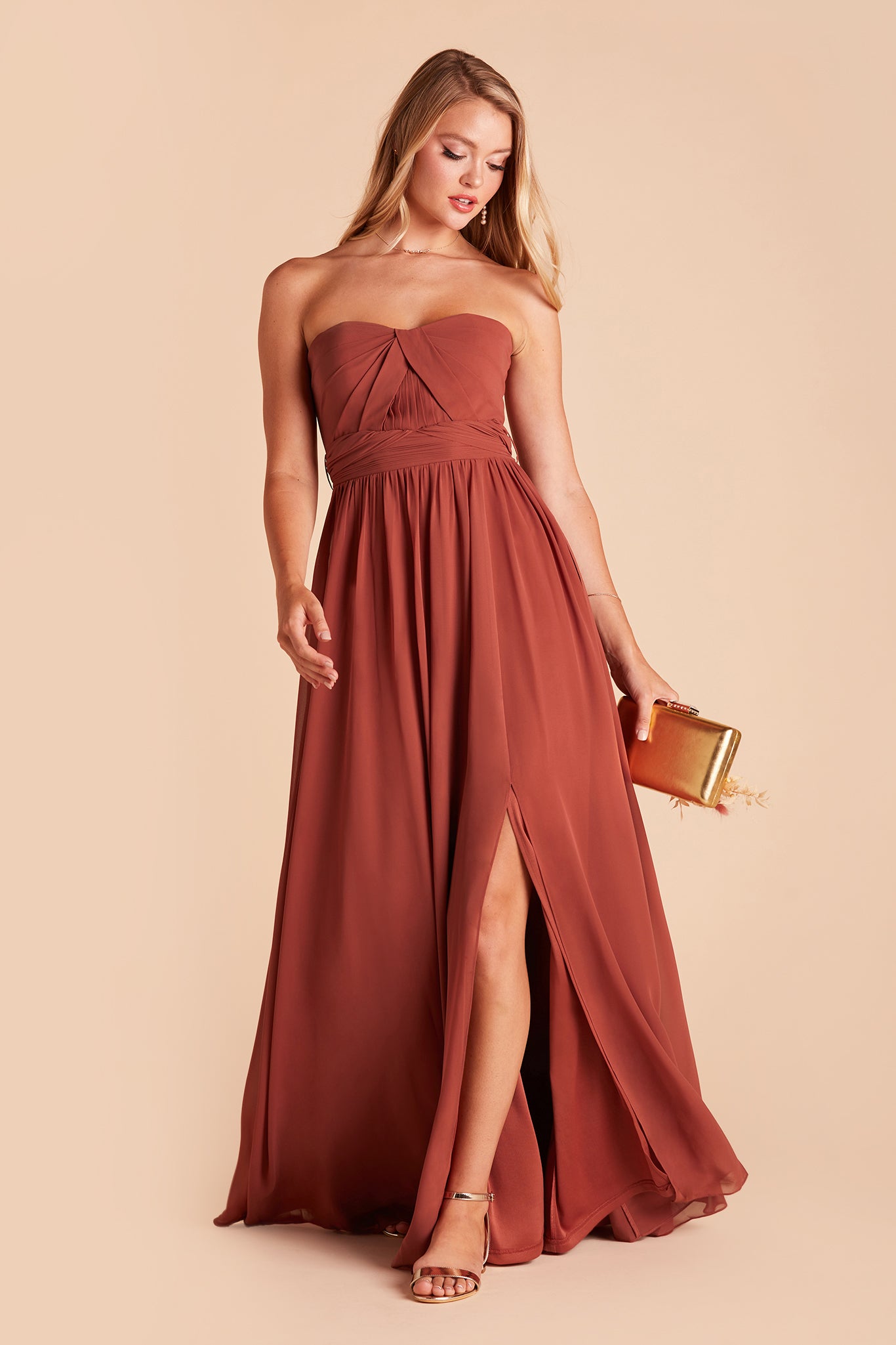 Grace convertible bridesmaid dress with slit in spice chiffon by Birdy Grey, front view with hand in pocket
