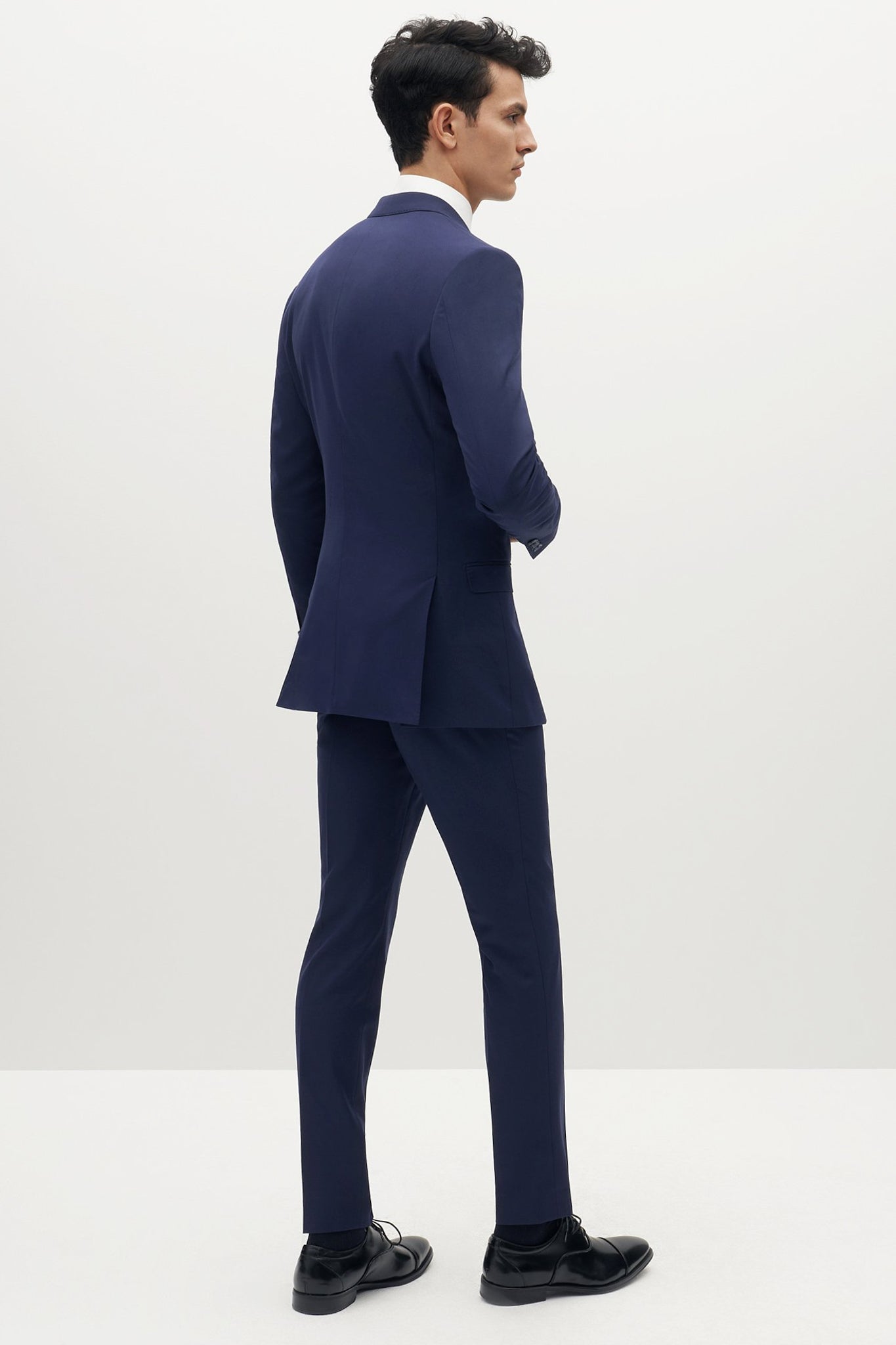 Brilliant Blue Groomsmen Suit by SuitShop, back view