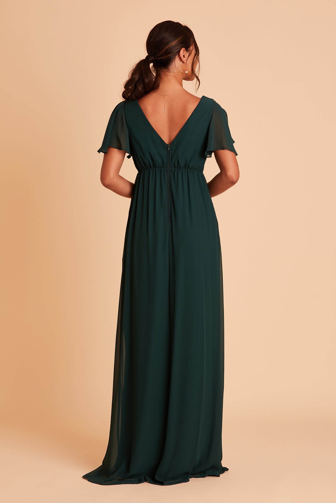 Hannah Empire bridesmaid dress with slit in emerald chiffon by Birdy Grey, back view