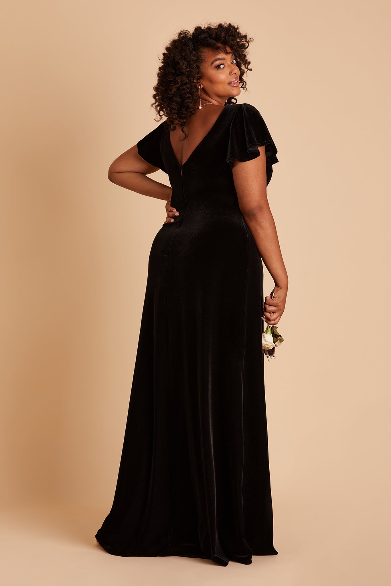 Hannah plus size bridesmaid dress with slit in black velvet by Birdy Grey, side view