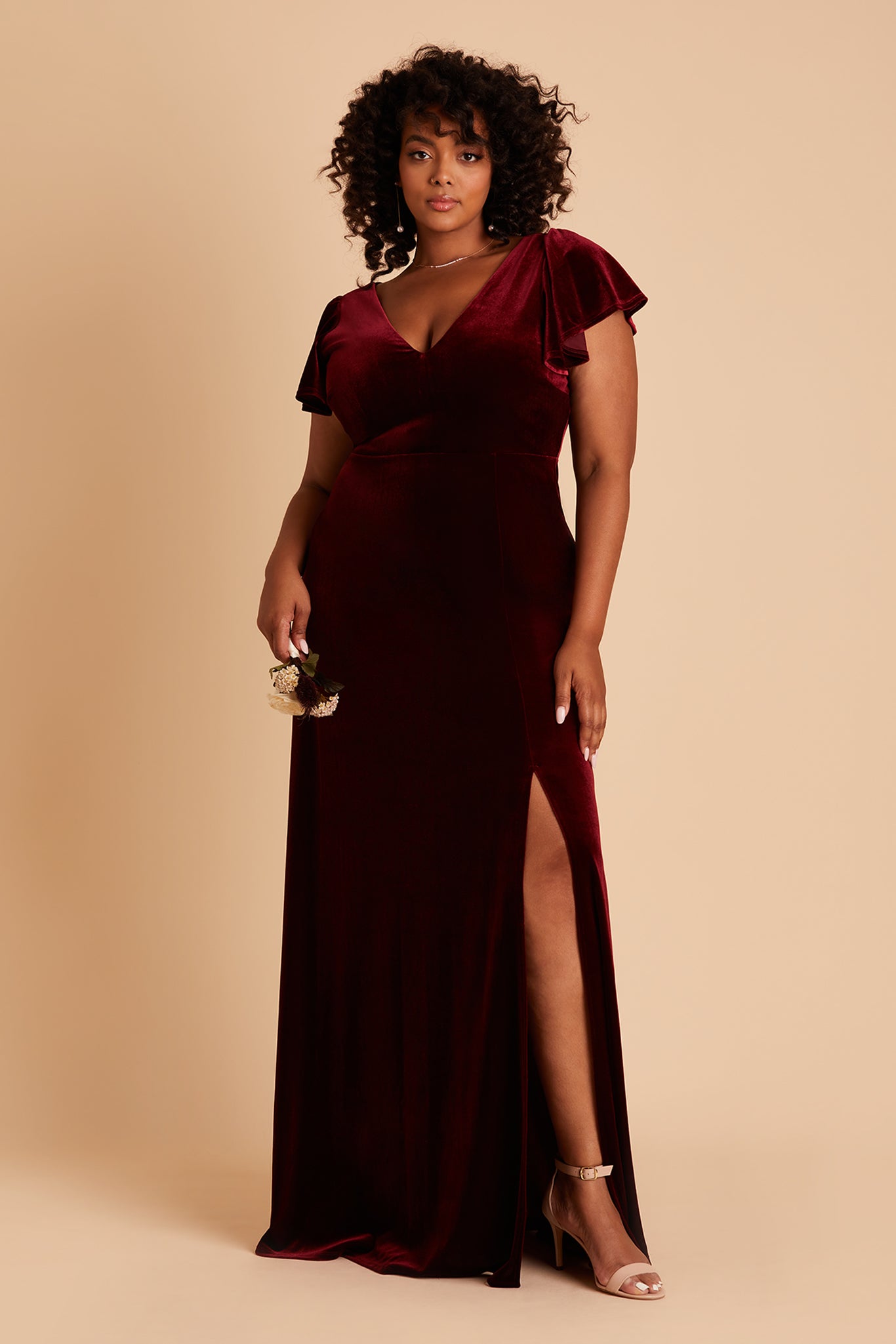 Hannah plus size bridesmaid dress with slit in cabernet velvet by Birdy Grey, side view