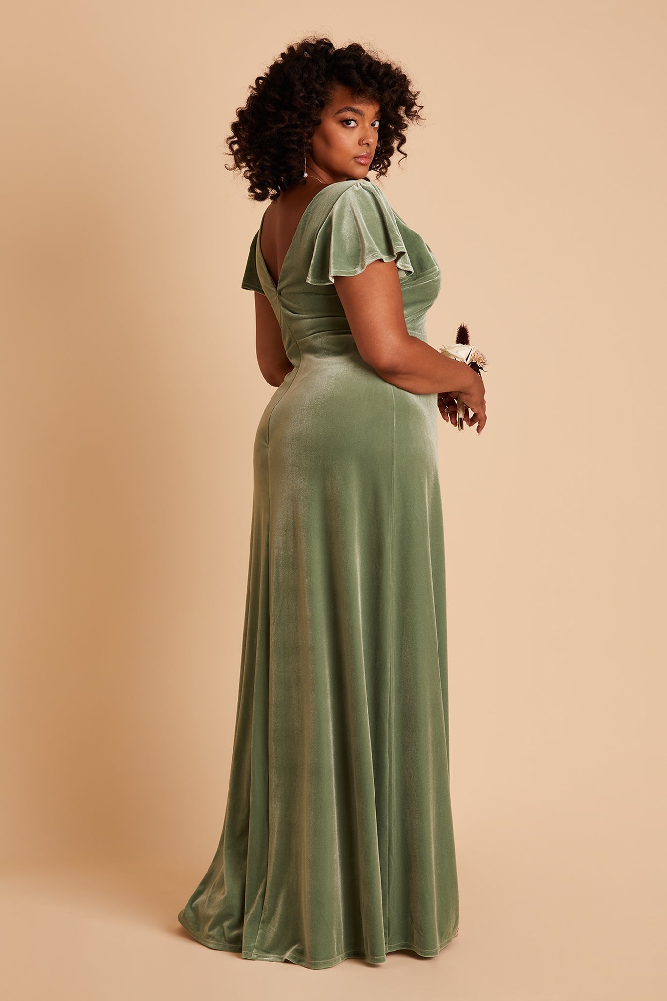 Hannah plus size bridesmaid dress with slit in dark sage velvet by Birdy Grey, side view