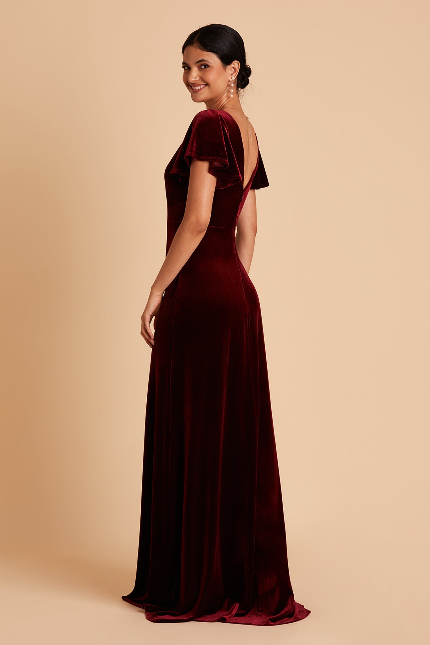 Hannah bridesmaid dress with slit in cabernet velvet by Birdy Grey, side view