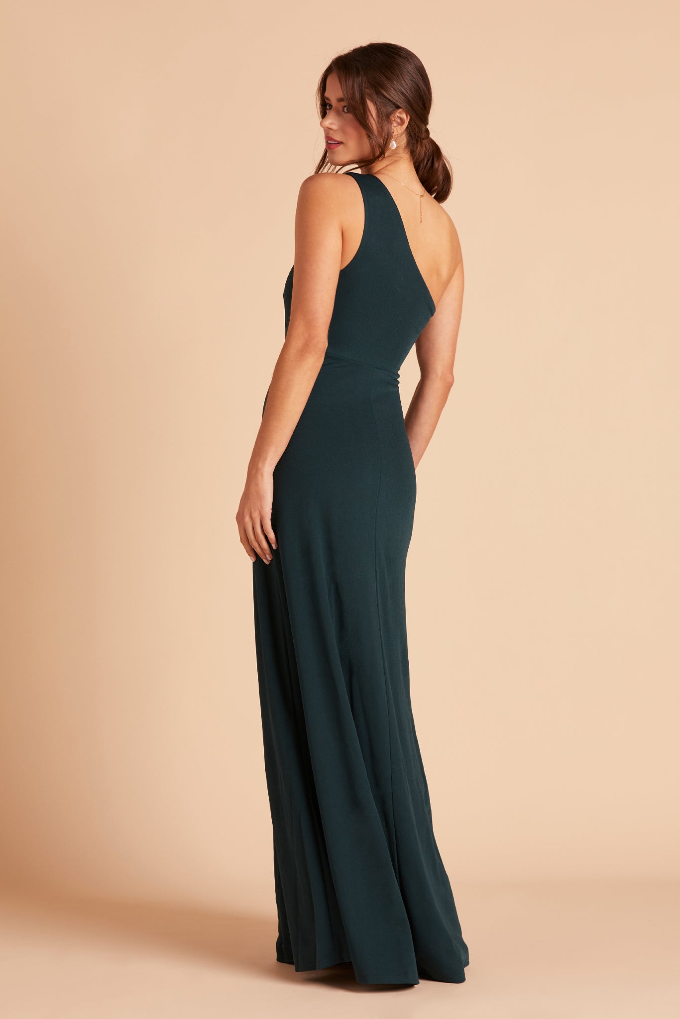 Kira bridesmaid dress with slit in emerald green crepe by Birdy Grey, side view