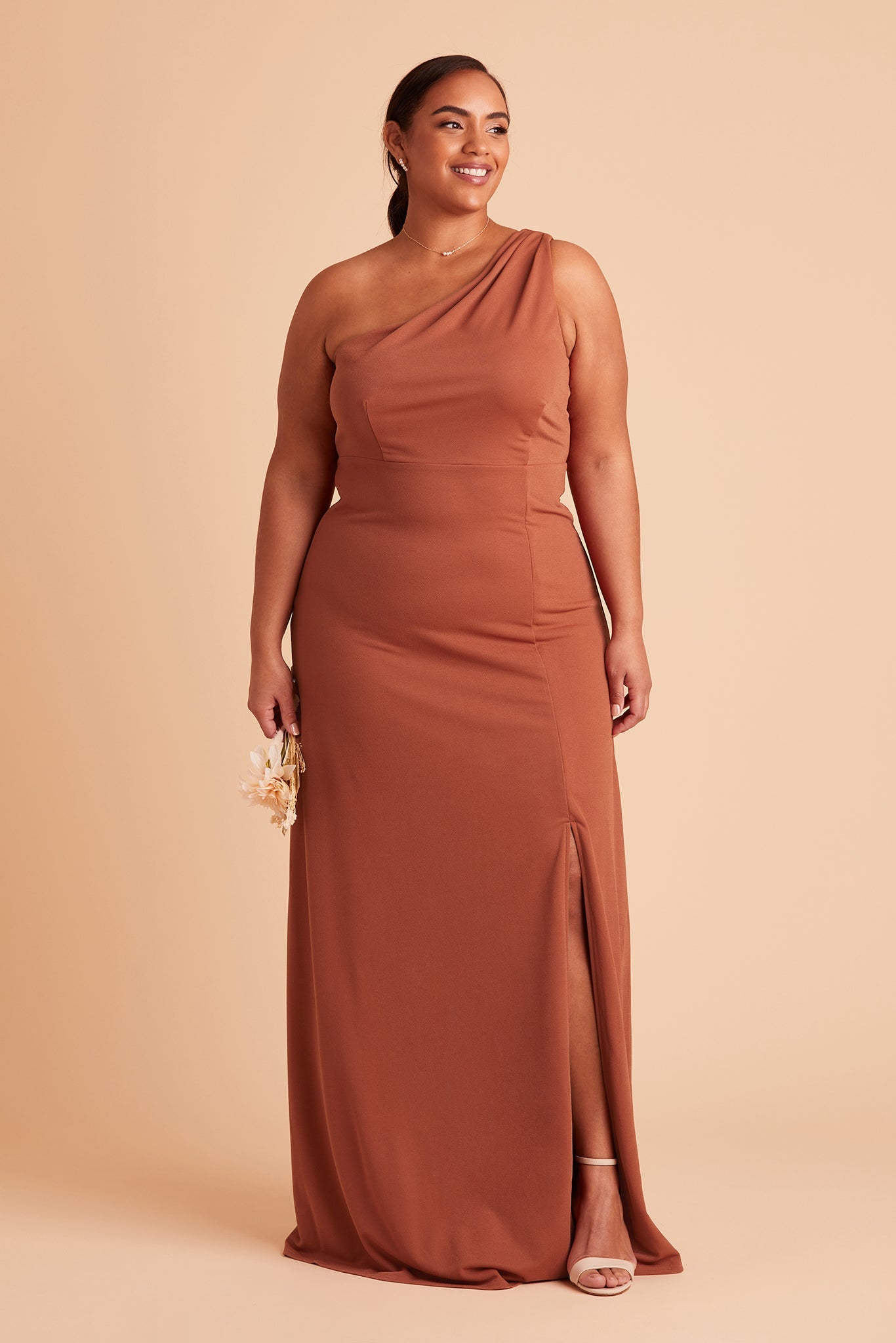 Kira plus size bridesmaid dress with slit in terracotta crepe by Birdy Grey, front view